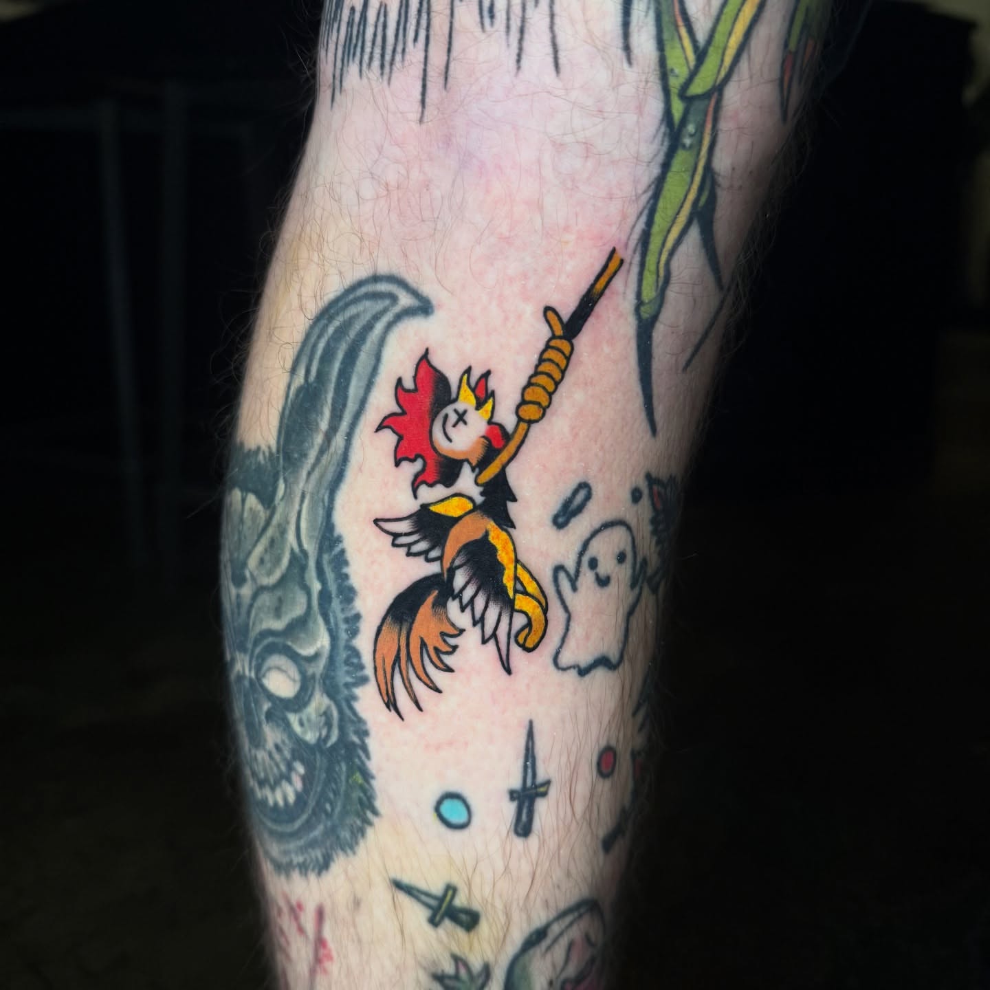 Rooster character American traditional tattoo on the forearm by Sideshow Danny