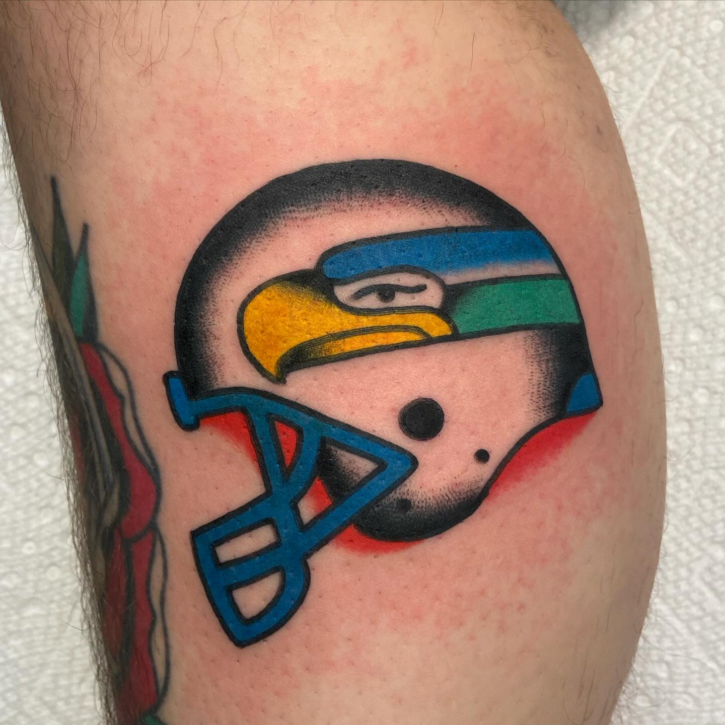 Hawk helmet dotwork tattoo on the forearm by Anthony Jaeger, Seattle, Washington