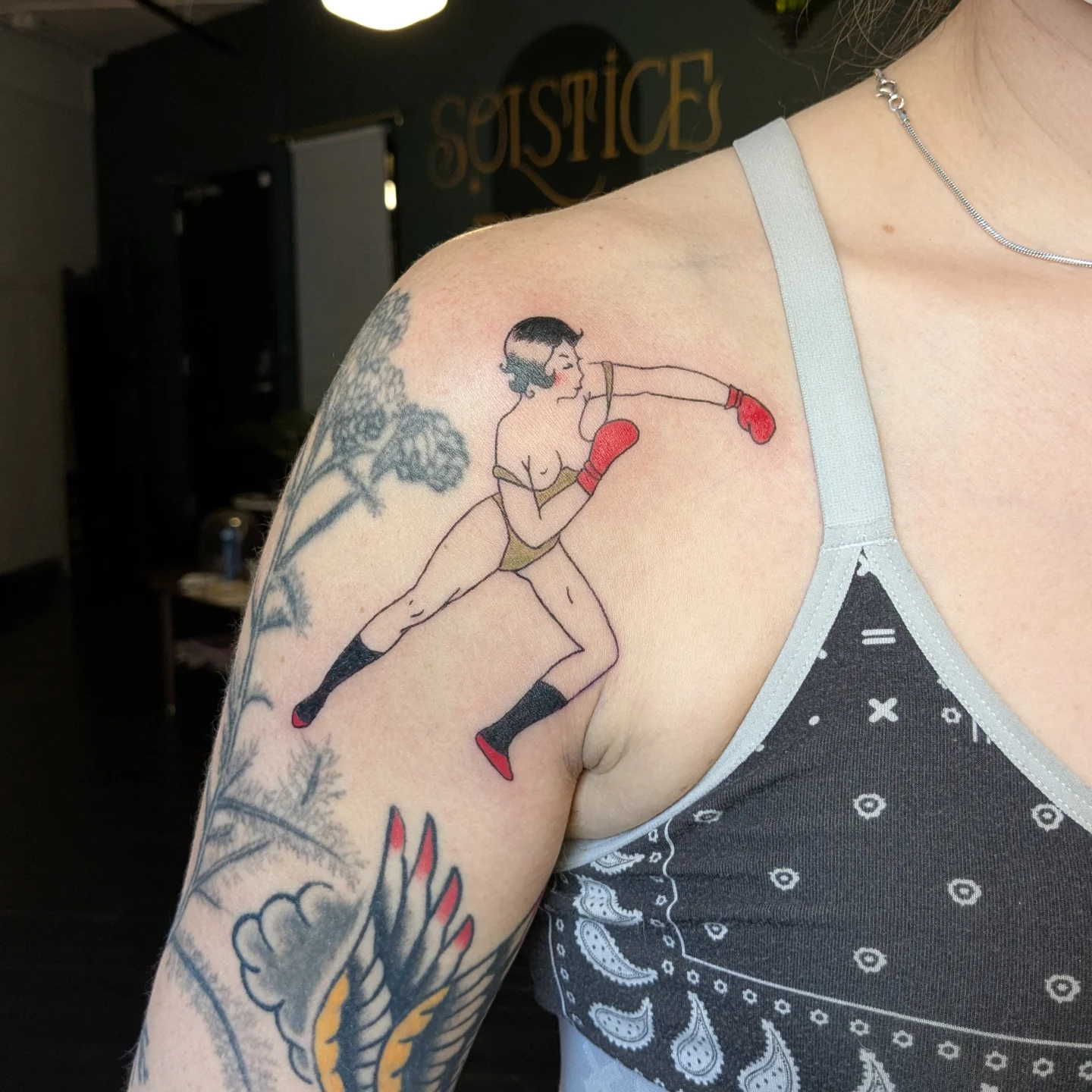 Boxing pin-up American traditional tattoo on the upper arm by Madison Cañedo ✺ Portland tattoo