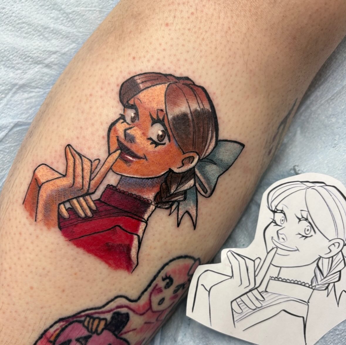 Anime character anime tattoo on the forearm by Gabby
