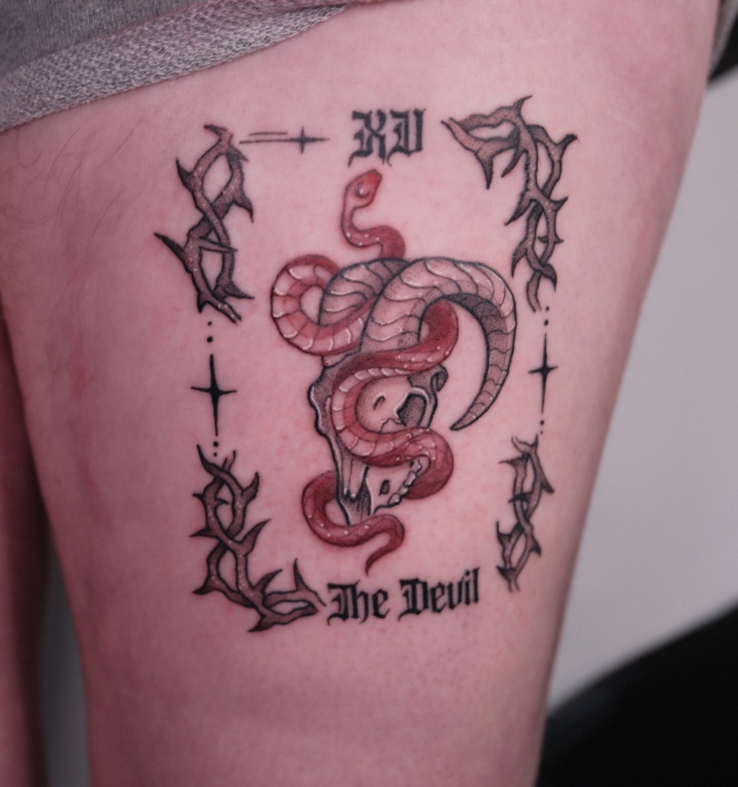 Snake neo-traditional tattoo on the thigh by Velvet, Seattle, Washington