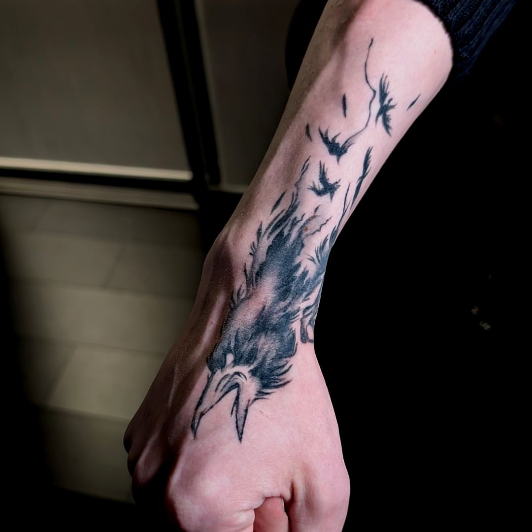 Feather black and grey tattoo on the forearm by Dave Chercourt, Willoughby, Ohio