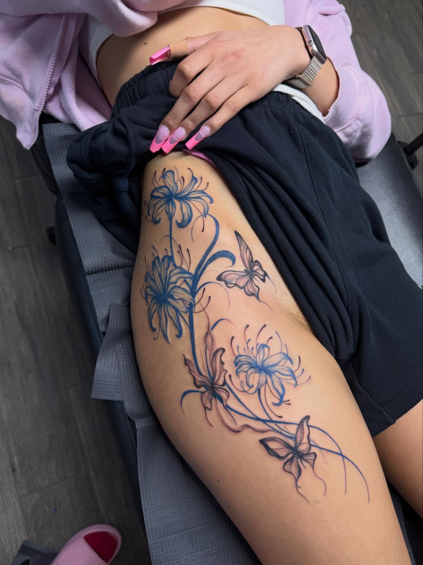 Floral arrangement new school tattoo on the thigh by Stephania ATLANTA TATTOO ARTIST🎨