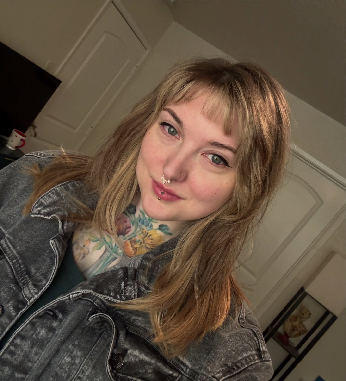 Floral black and grey tattoo on the neck by Nichole Lorence