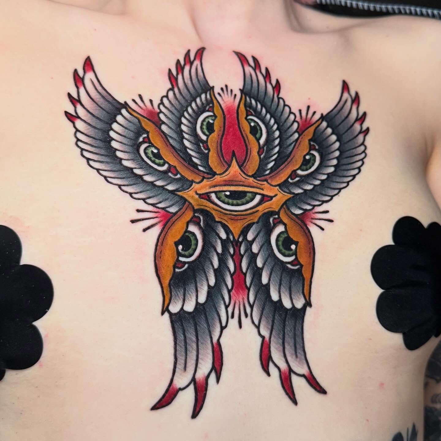 Owl American traditional tattoo on the chest by Zac Chaffin