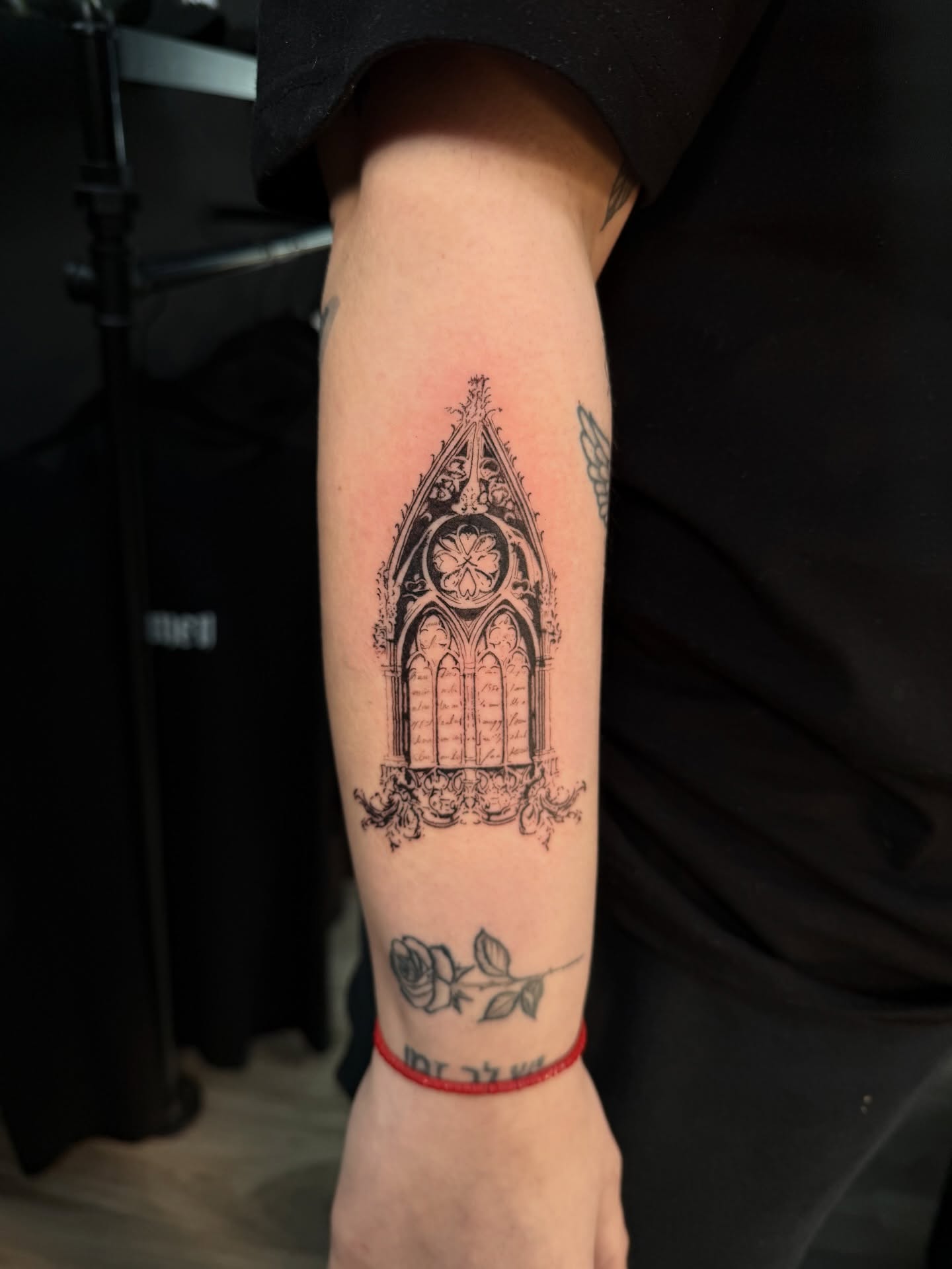 Gothic window black and grey tattoo on the forearm by Elijah Cosme, Miami, Florida