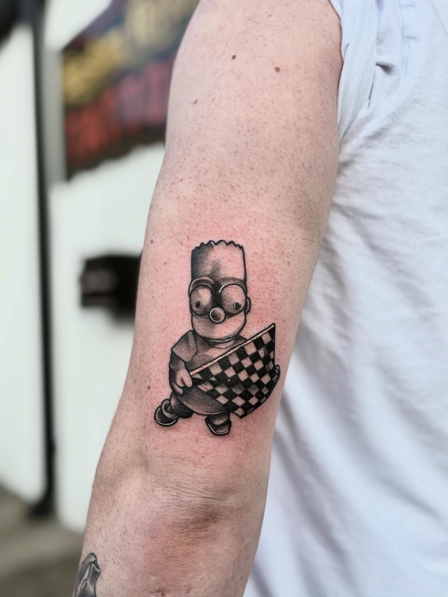 Bart simpson black and grey tattoo on the forearm by Mim