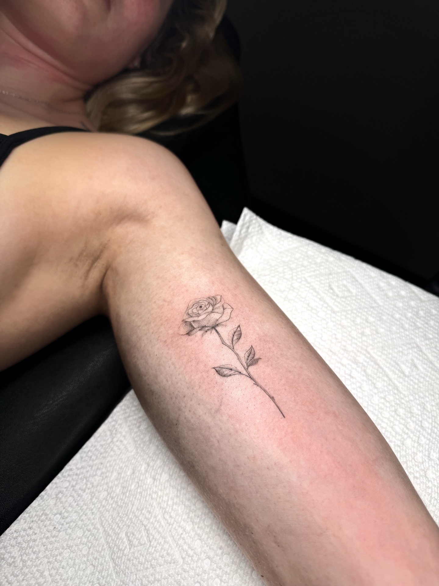 Rose black and grey tattoo on the forearm by ꜰɪɴᴇ ʟɪɴᴇ ᴛᴀᴛᴛᴏᴏꜱ