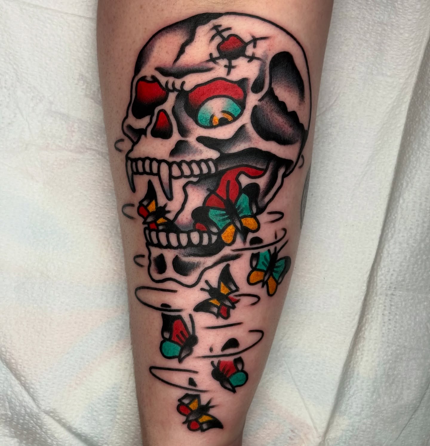 Skull with butterflies American traditional tattoo on the forearm by ๐ฎ๐๐๐๐ ๐ญ๐๐๐๐๐