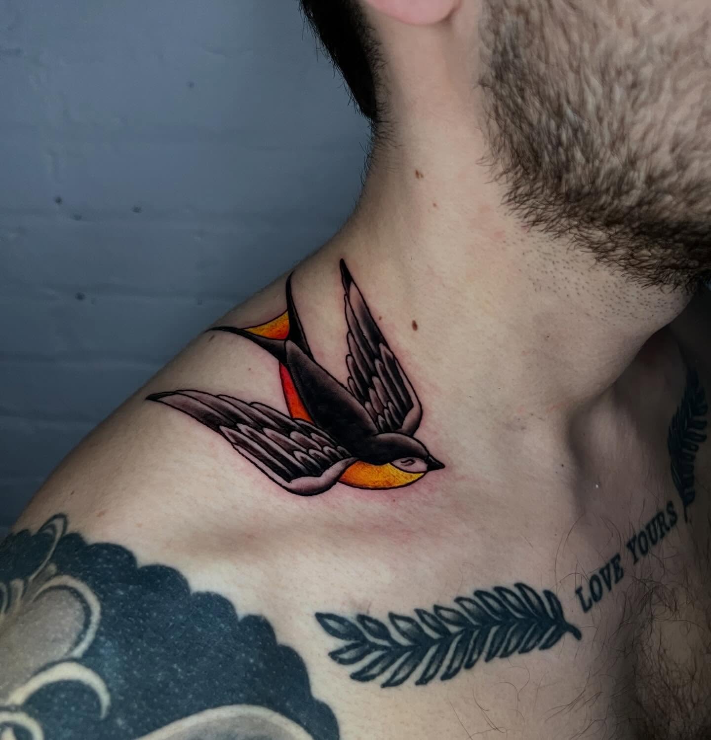 Bird American traditional tattoo on the shoulder by Eoghann McGregor