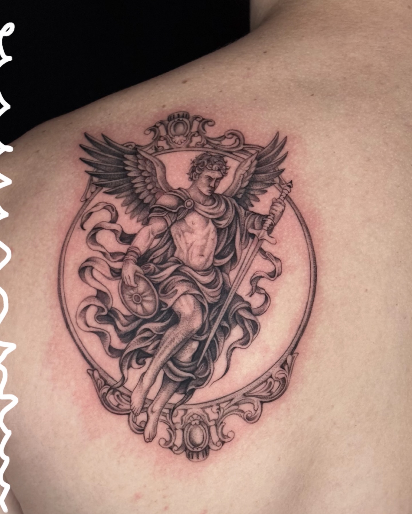Angel with sword realism tattoo on the shoulder by Tiny
