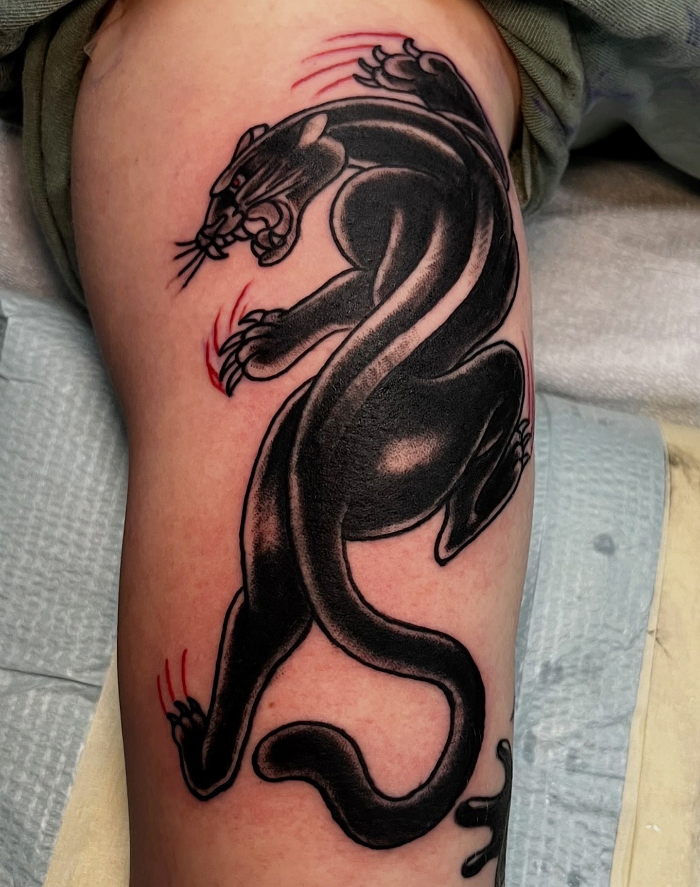 Dragon black and grey tattoo on the forearm by Andrew Snowden