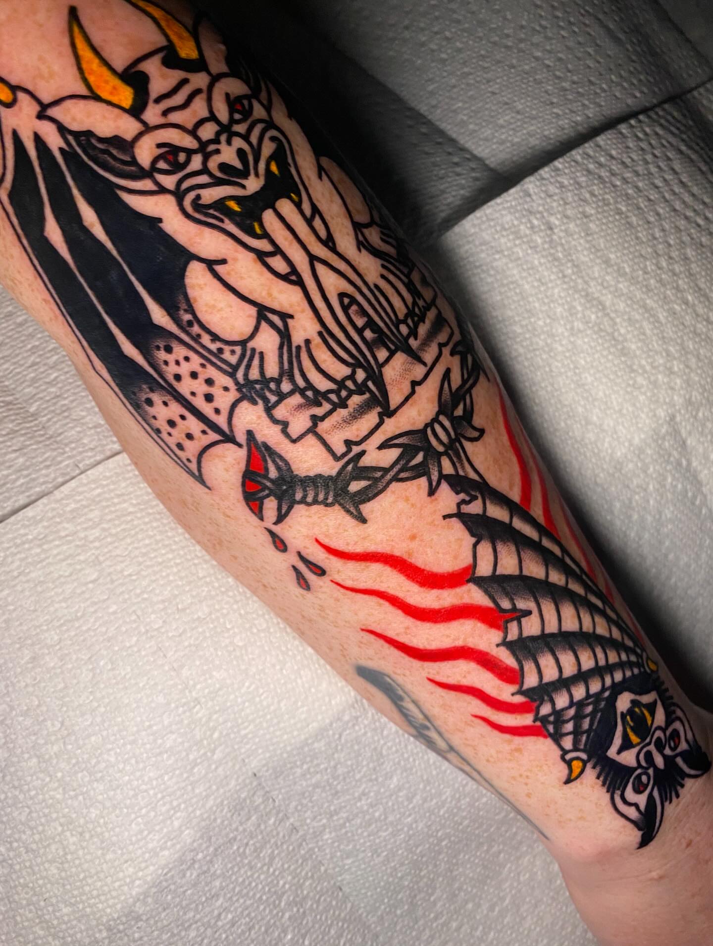Demon and ship American traditional tattoo on the forearm by Nosferatu