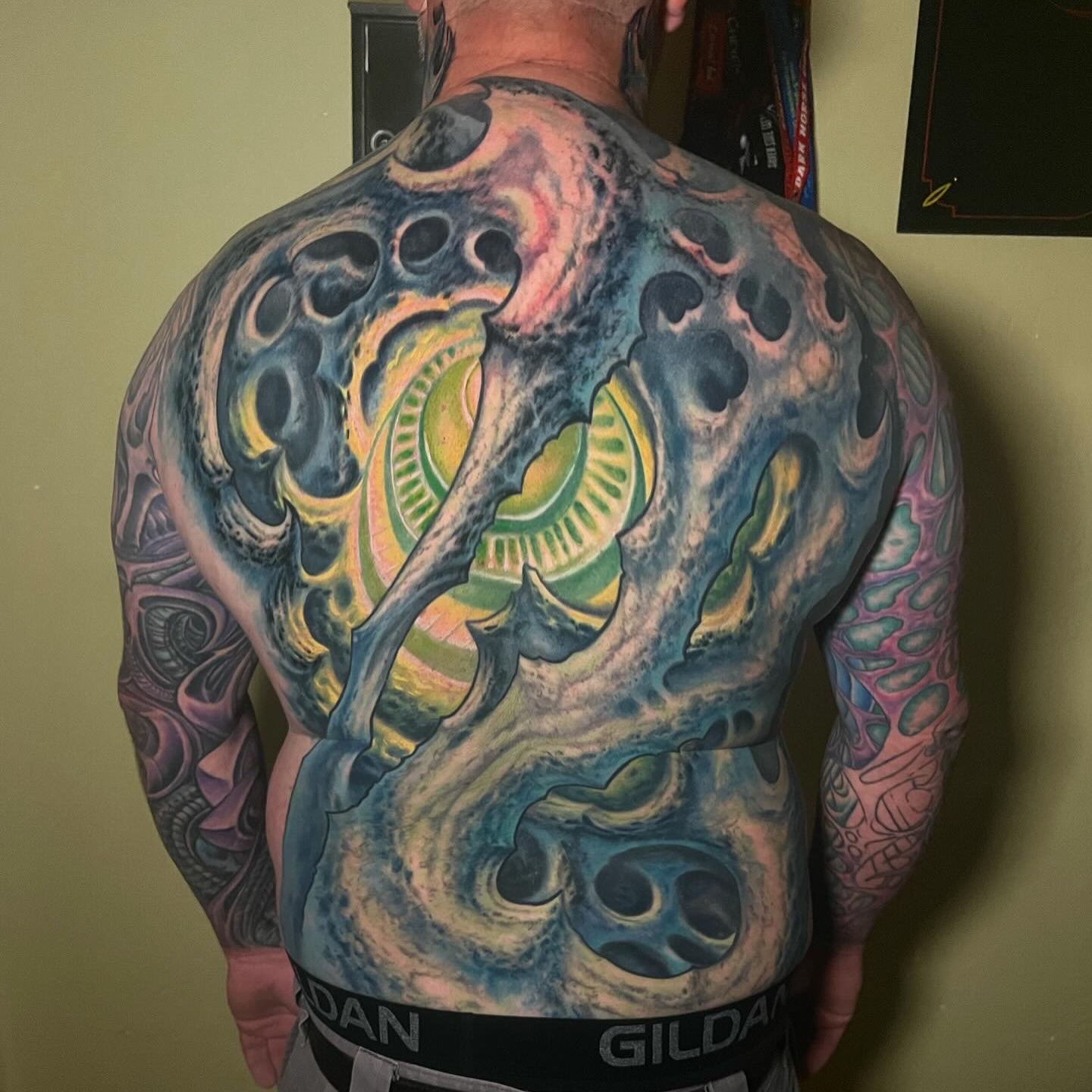 Abstract cosmic scene surrealism tattoo on the back by Ty McEwen Tattoo Artist │ Bioorganic │