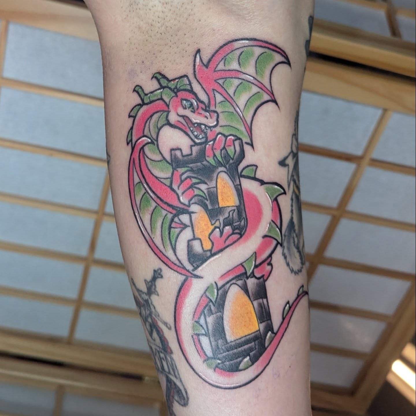 Dragon American traditional tattoo on the forearm by Nico Capriotti ๐ณ๏ธโ๐