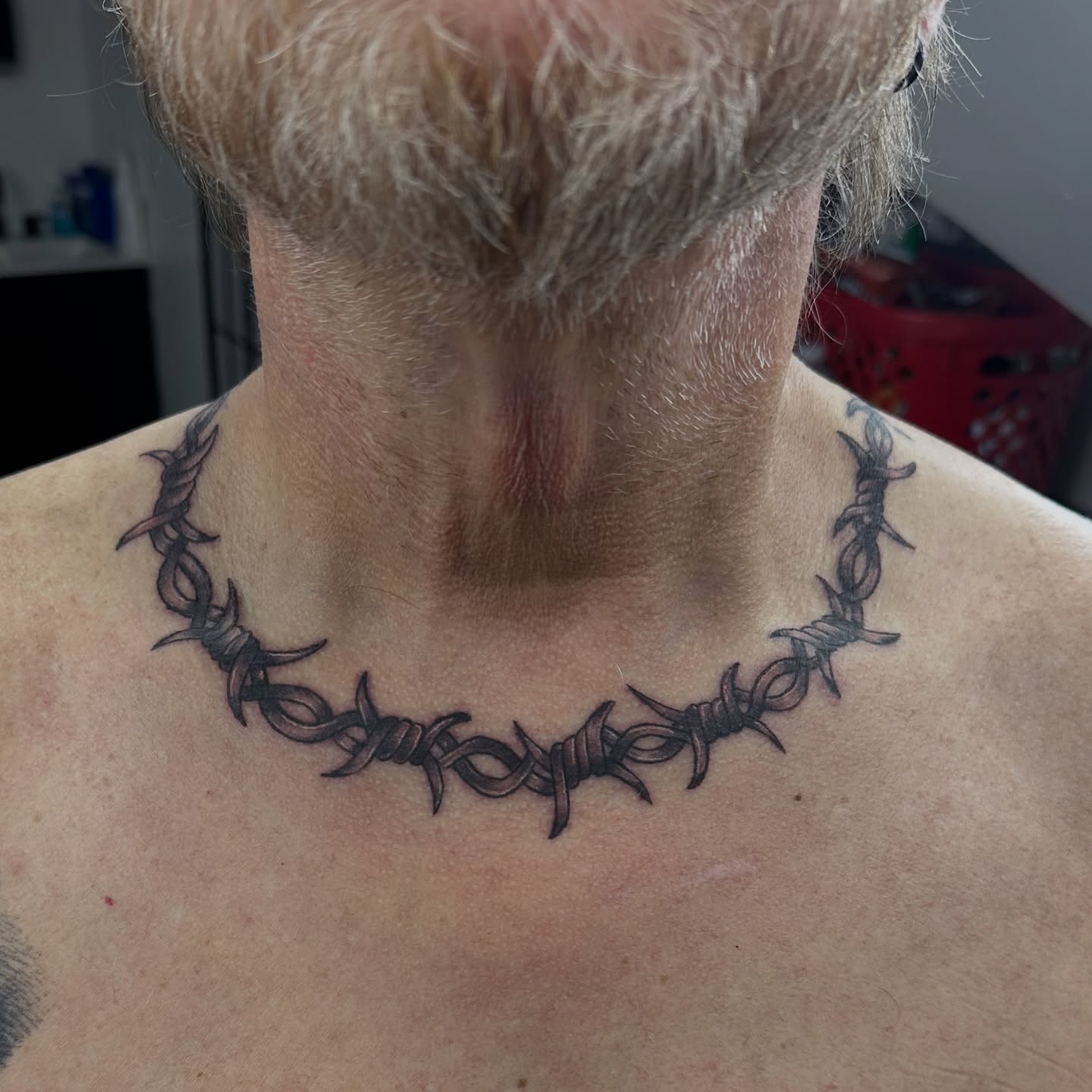 Barbed wire black and grey tattoo on the neck by Sk Pierce