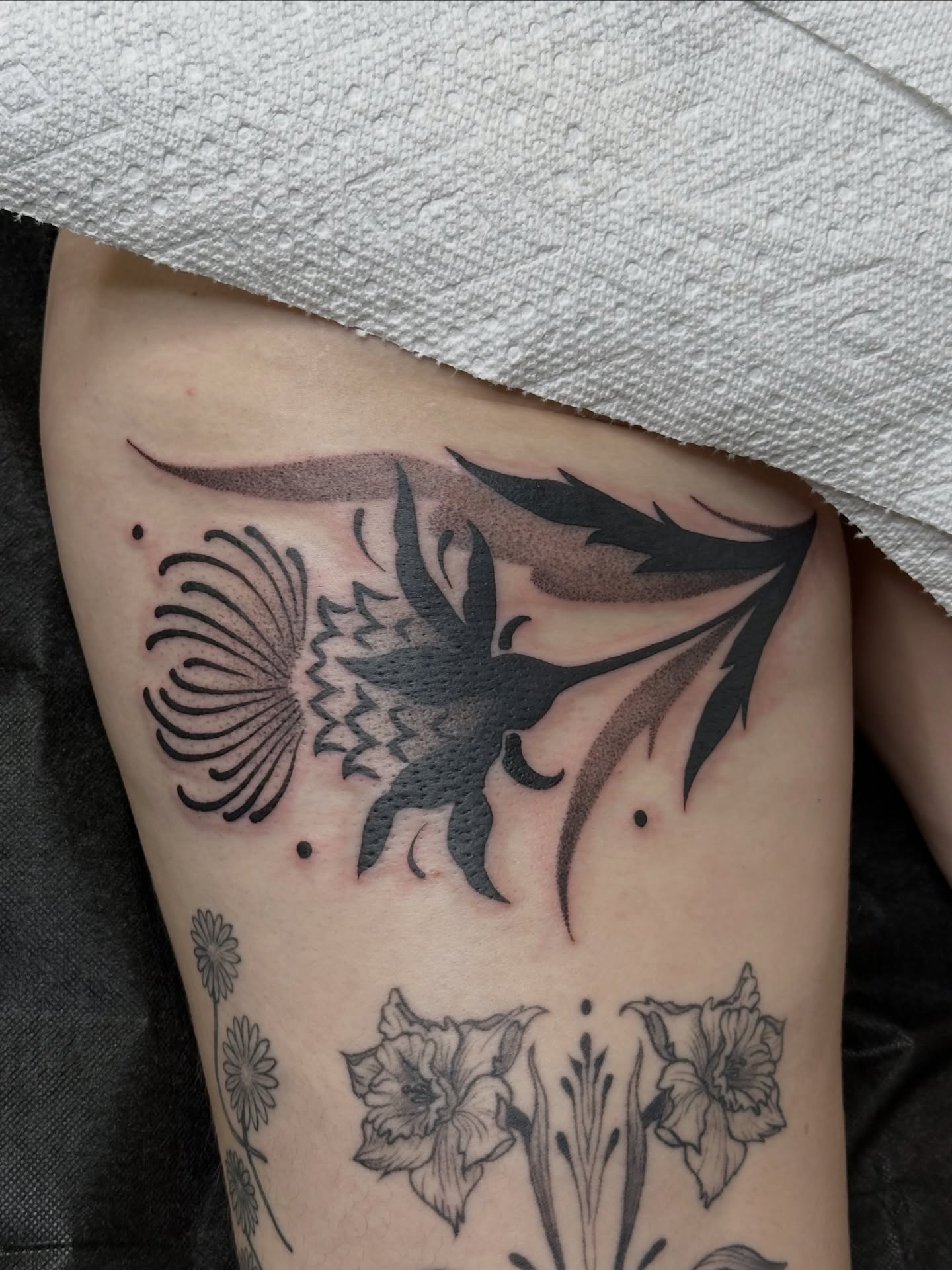 Thistle black and grey tattoo on the thigh by Summer Shield