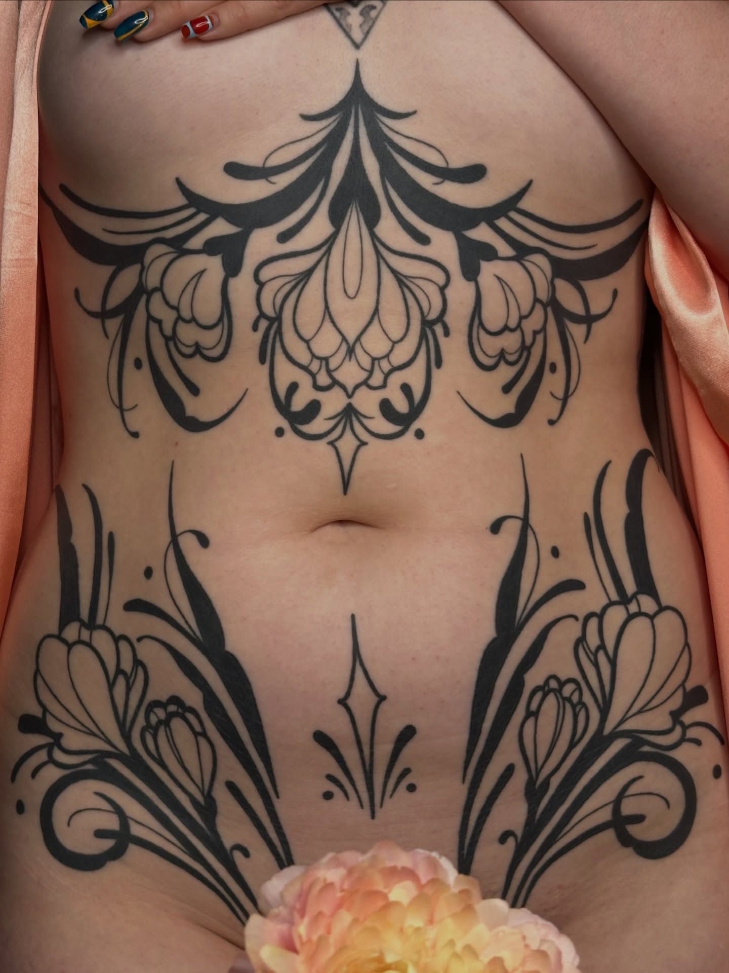 Floral ornament ornamental tattoo on the torso by Summer Shield