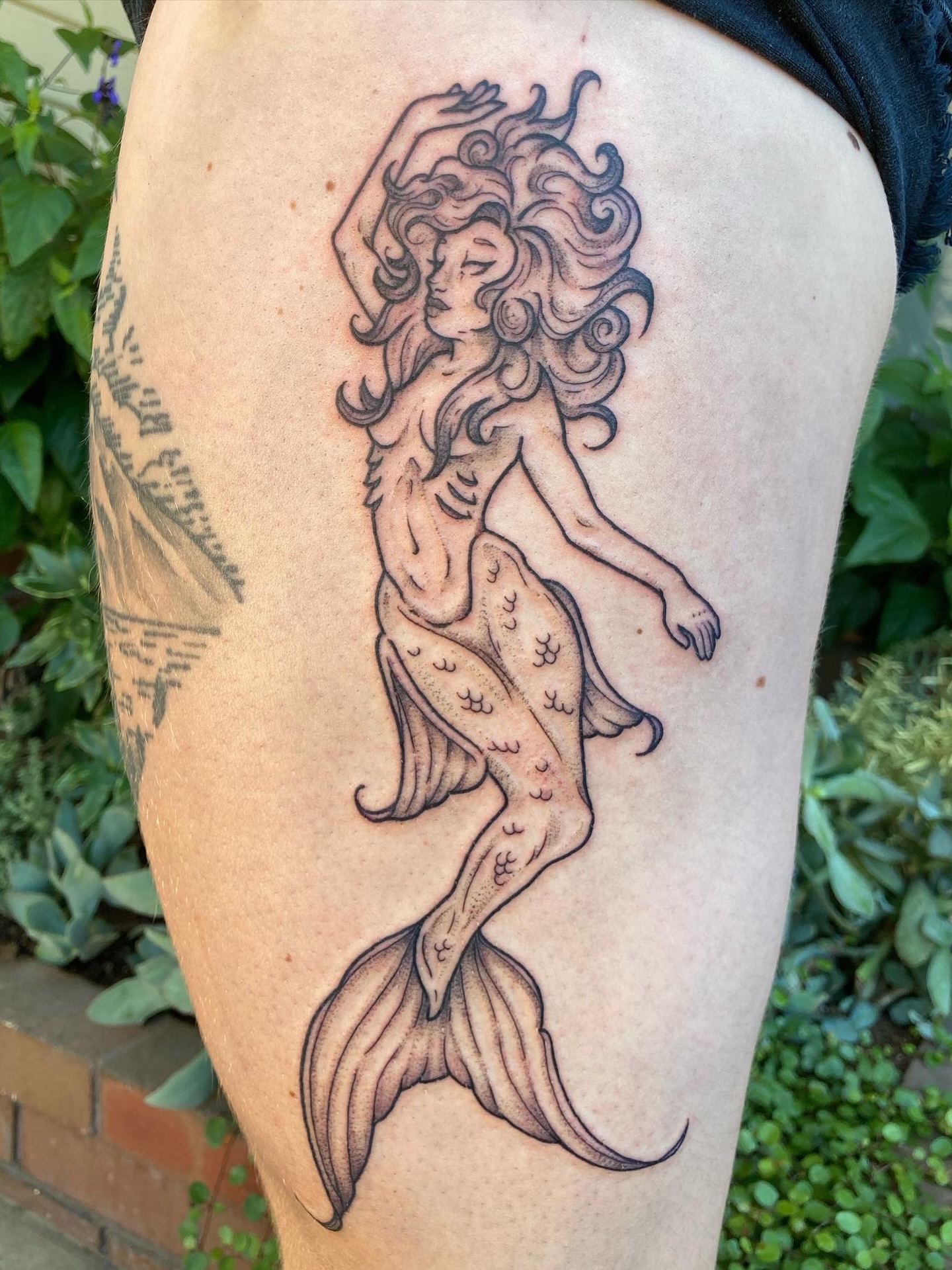 Mermaid black and grey tattoo on the thigh by Summer Shield