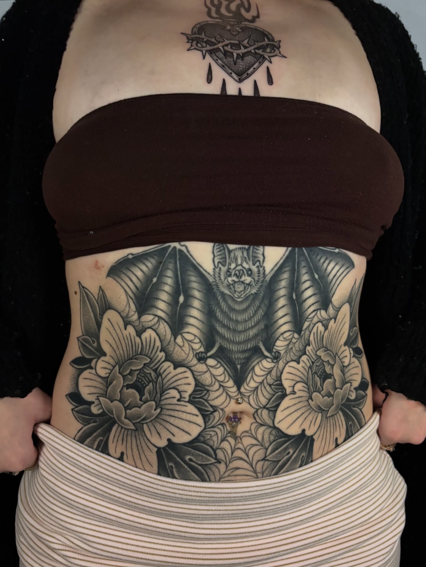 Bat and flowers realism tattoo on the torso by π―πππππ