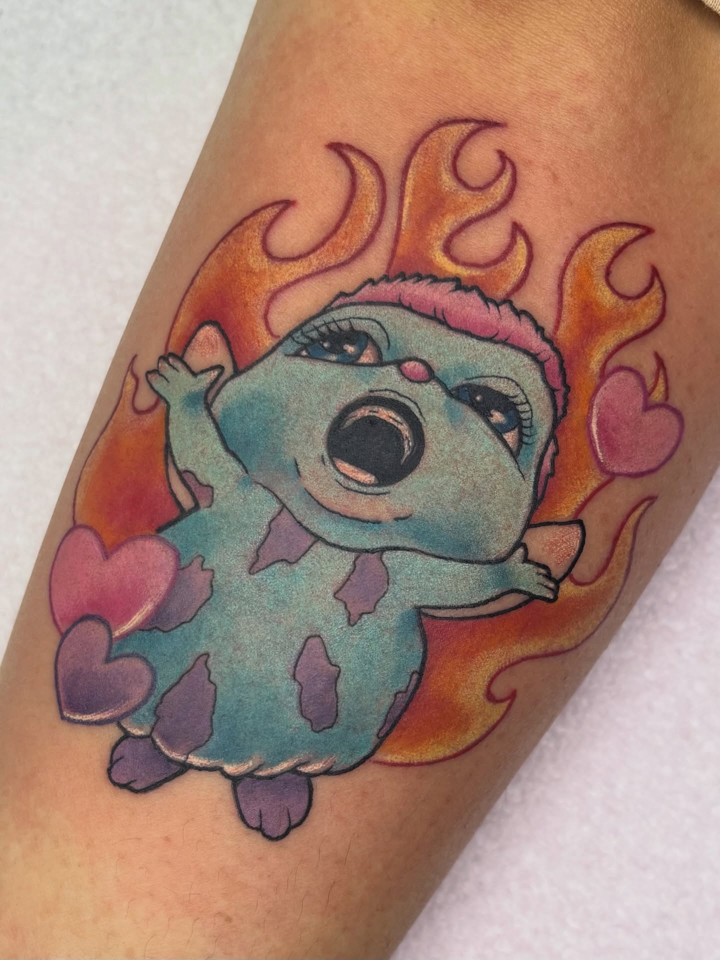 Monster new school tattoo on the forearm by Lilac Rose
