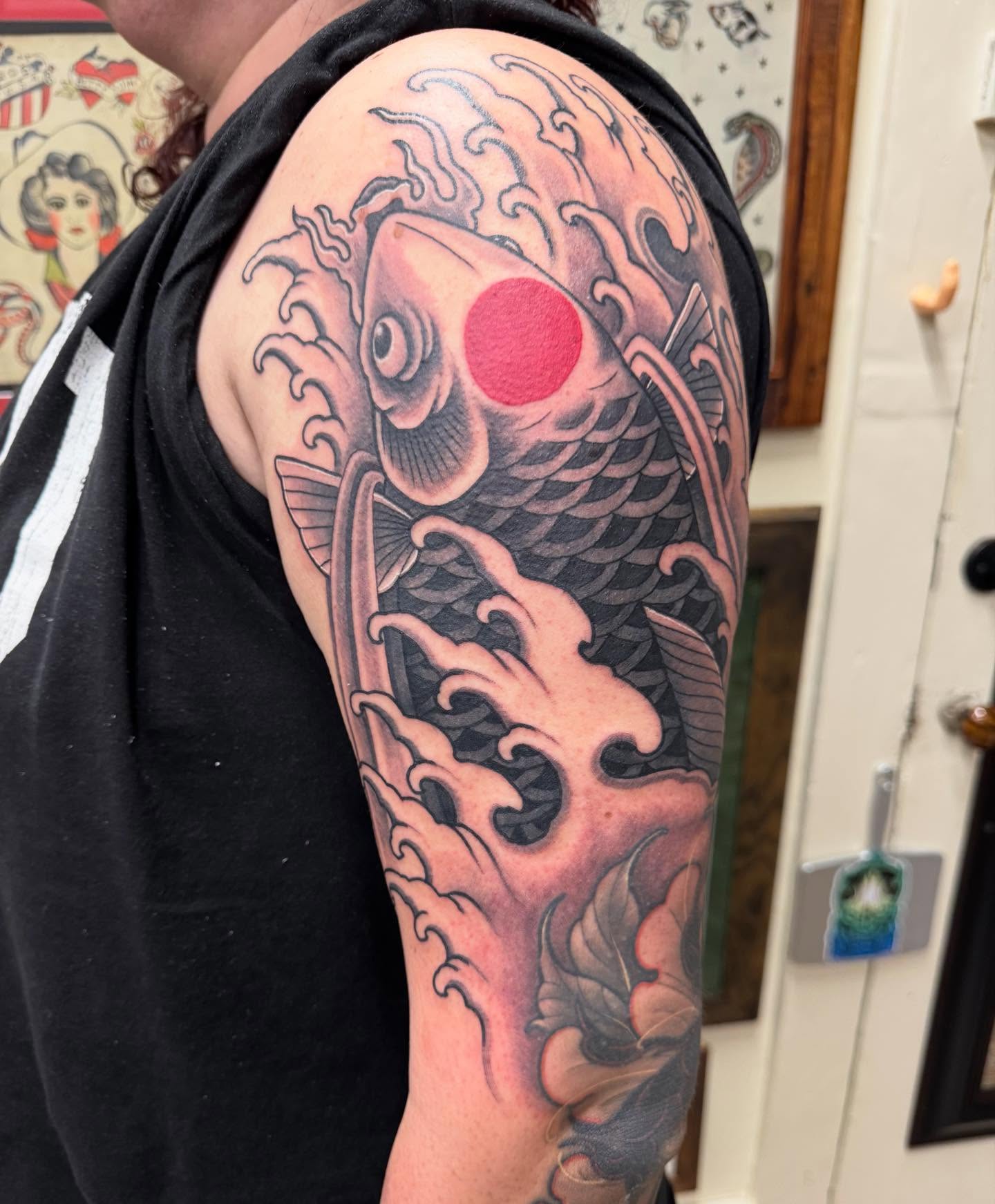 Koi fish japanese irezumi tattoo on the forearm by Jeremy Justice, New Orleans, Louisiana