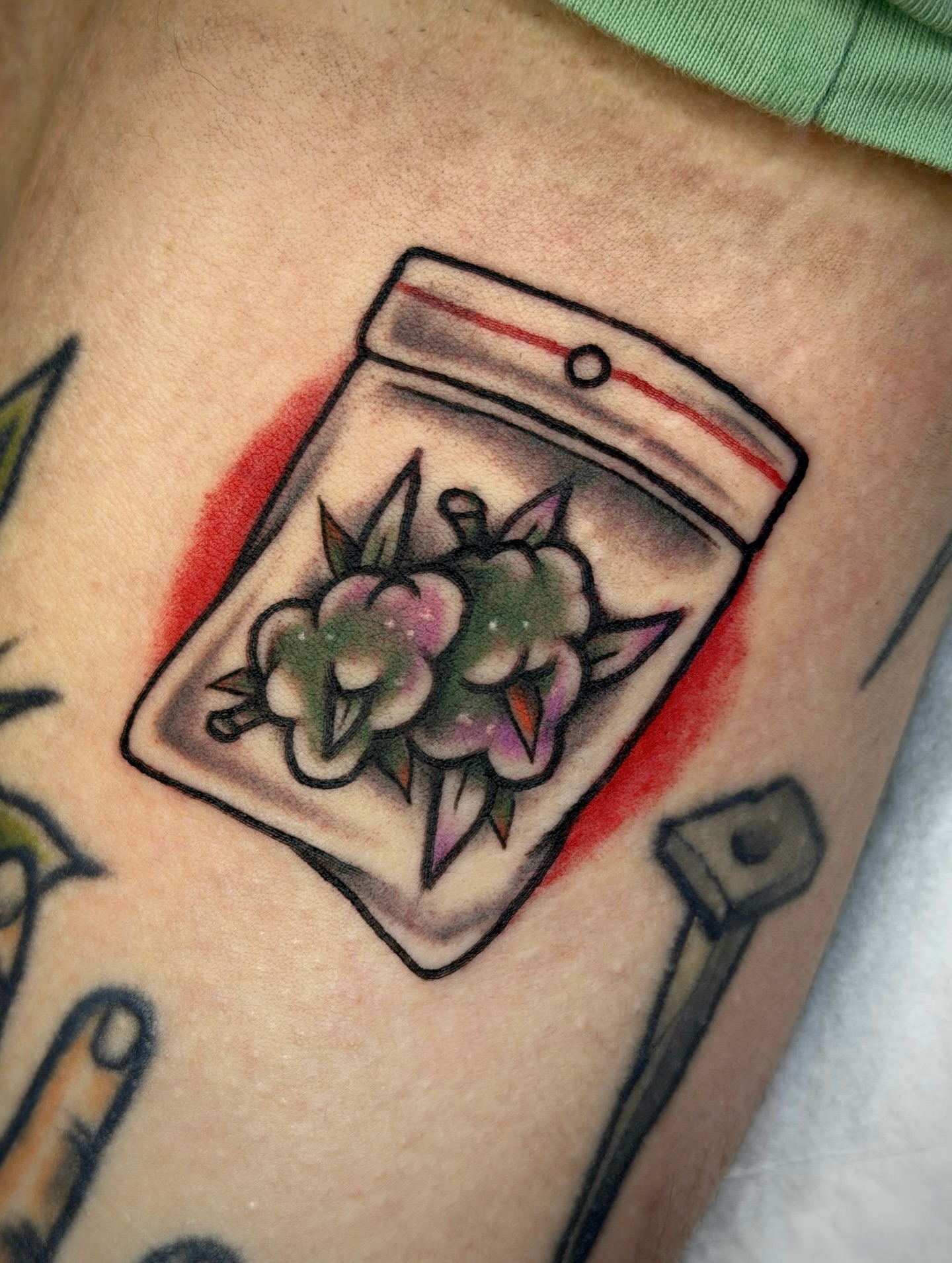 Marijuana American traditional tattoo on the thigh by Black and color tattoo!