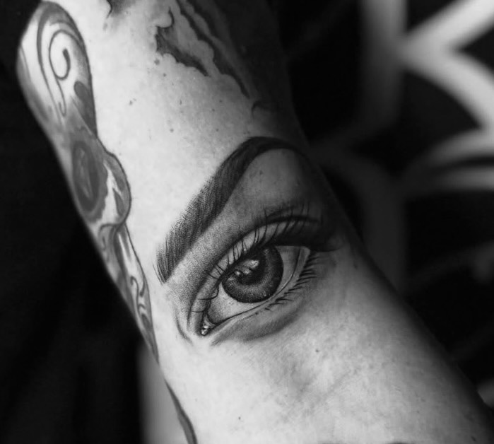 Eye realism tattoo on the forearm by Giana Martinez, Wichita, Kansas