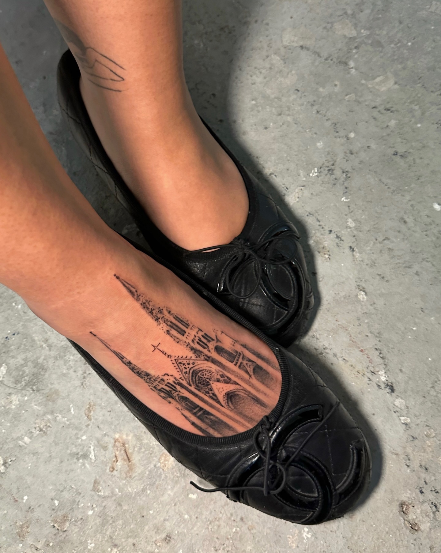 Gothic cathedral black and grey tattoo on the foot by kale