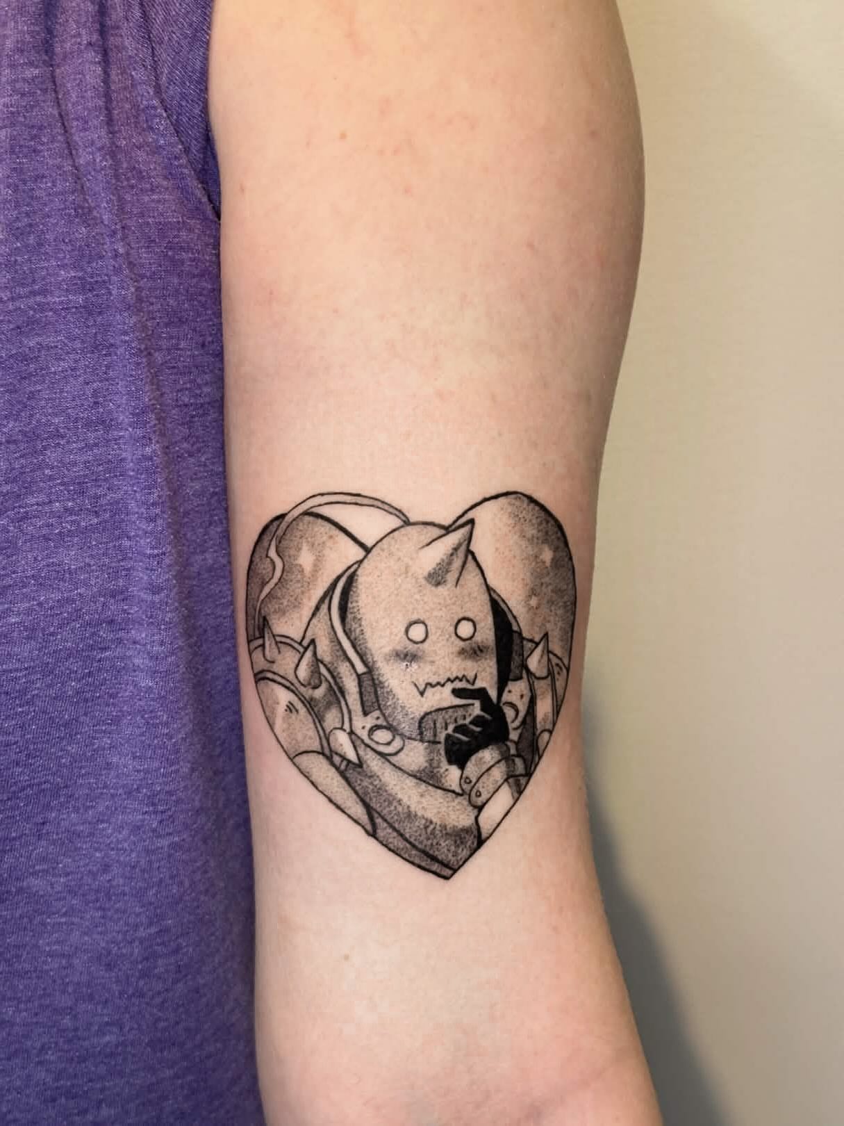 Astronaut helmet black and grey tattoo on the forearm by Lex