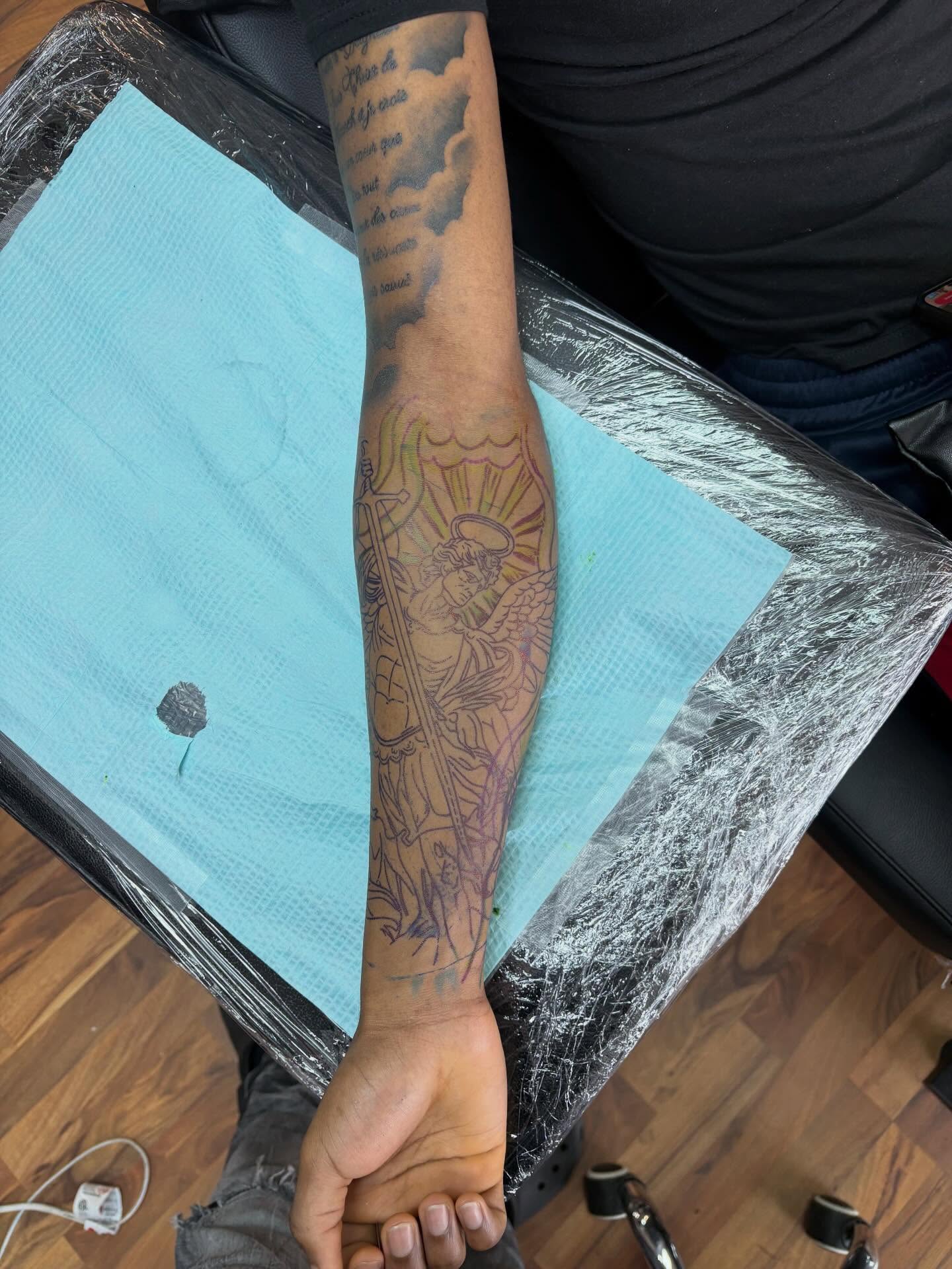 Religious figure American traditional tattoo on the forearm by 𓂀 𝕊ℍ𝔼𝕃𝕃𝕐 𓂀