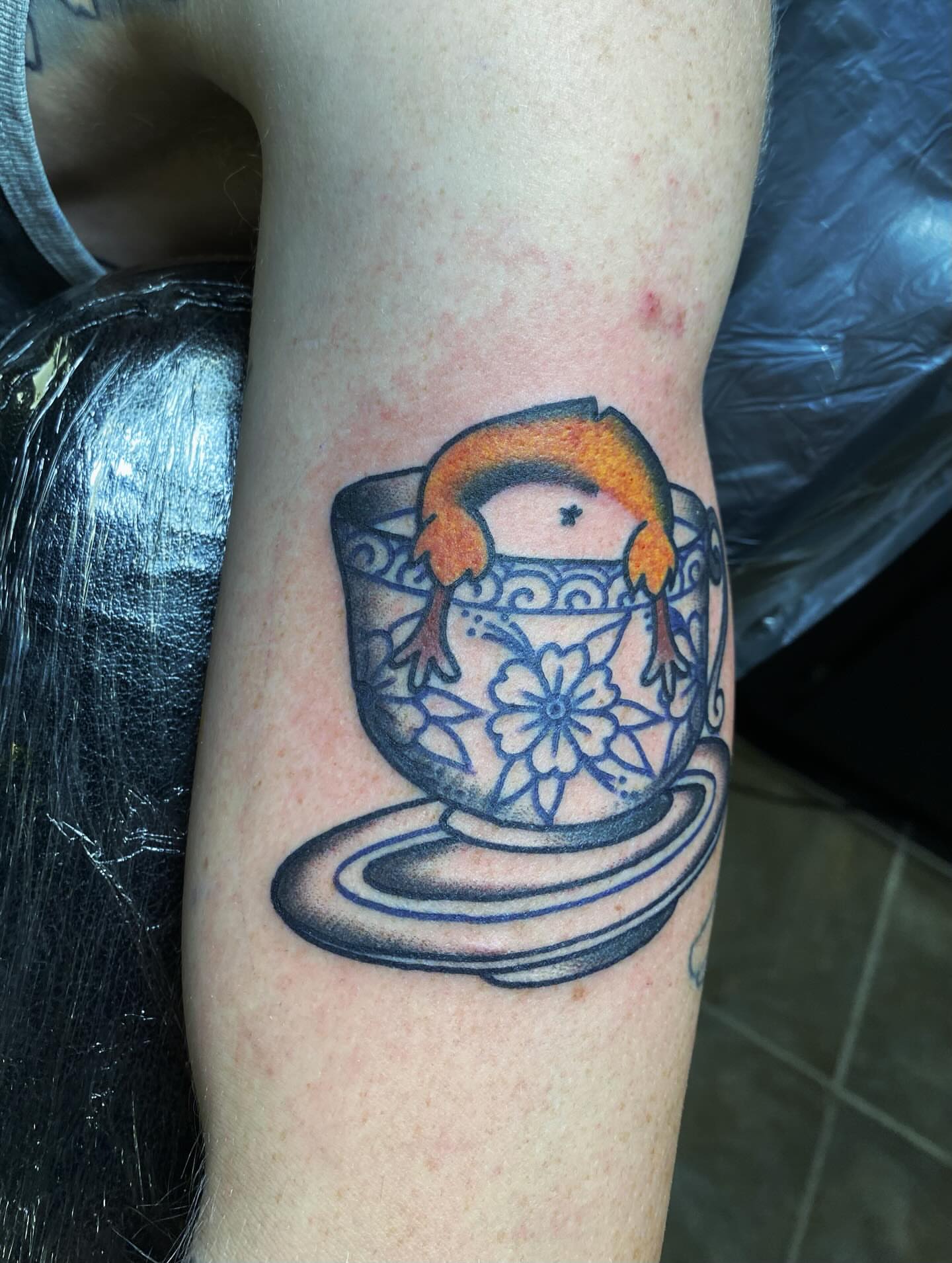 Tea cup and frog new school tattoo on the forearm by Houston tattoo artist