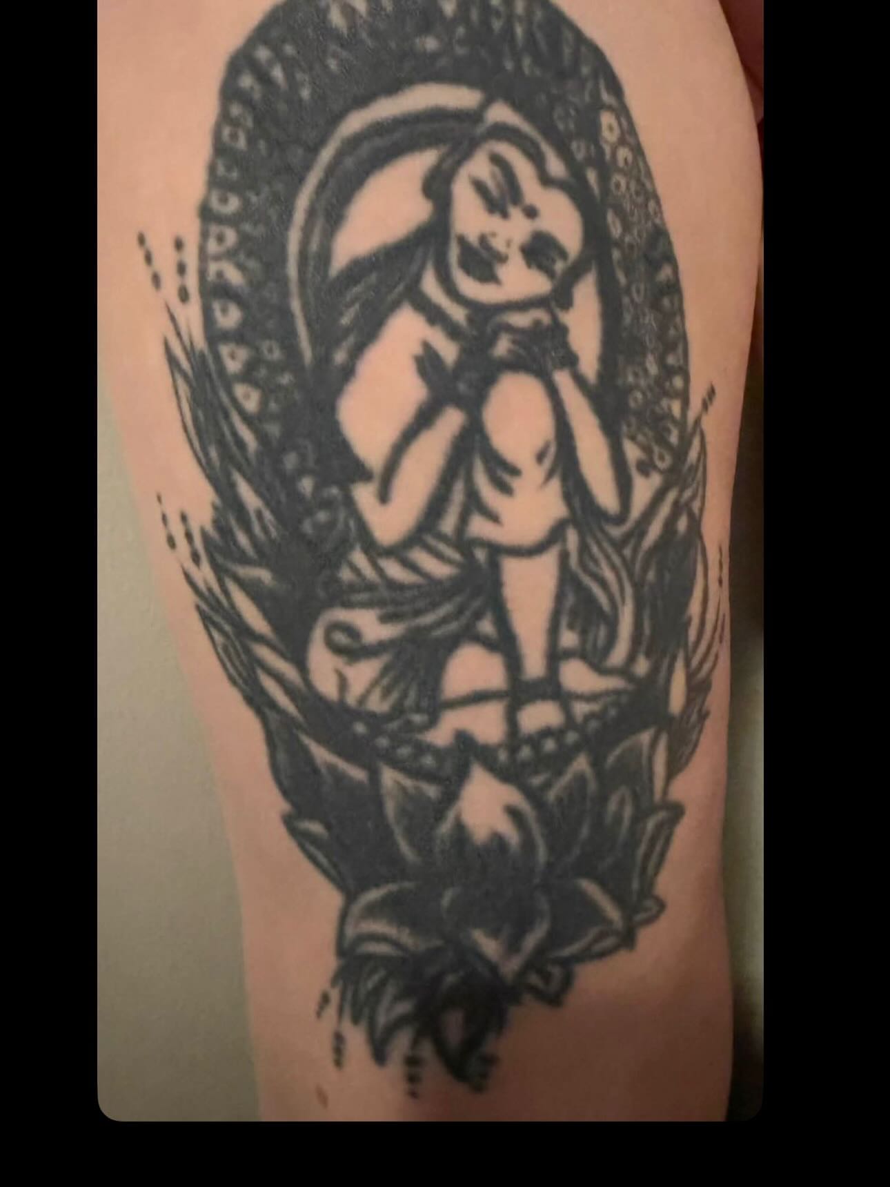 Woman with snake black and grey tattoo on the forearm by Lindsay