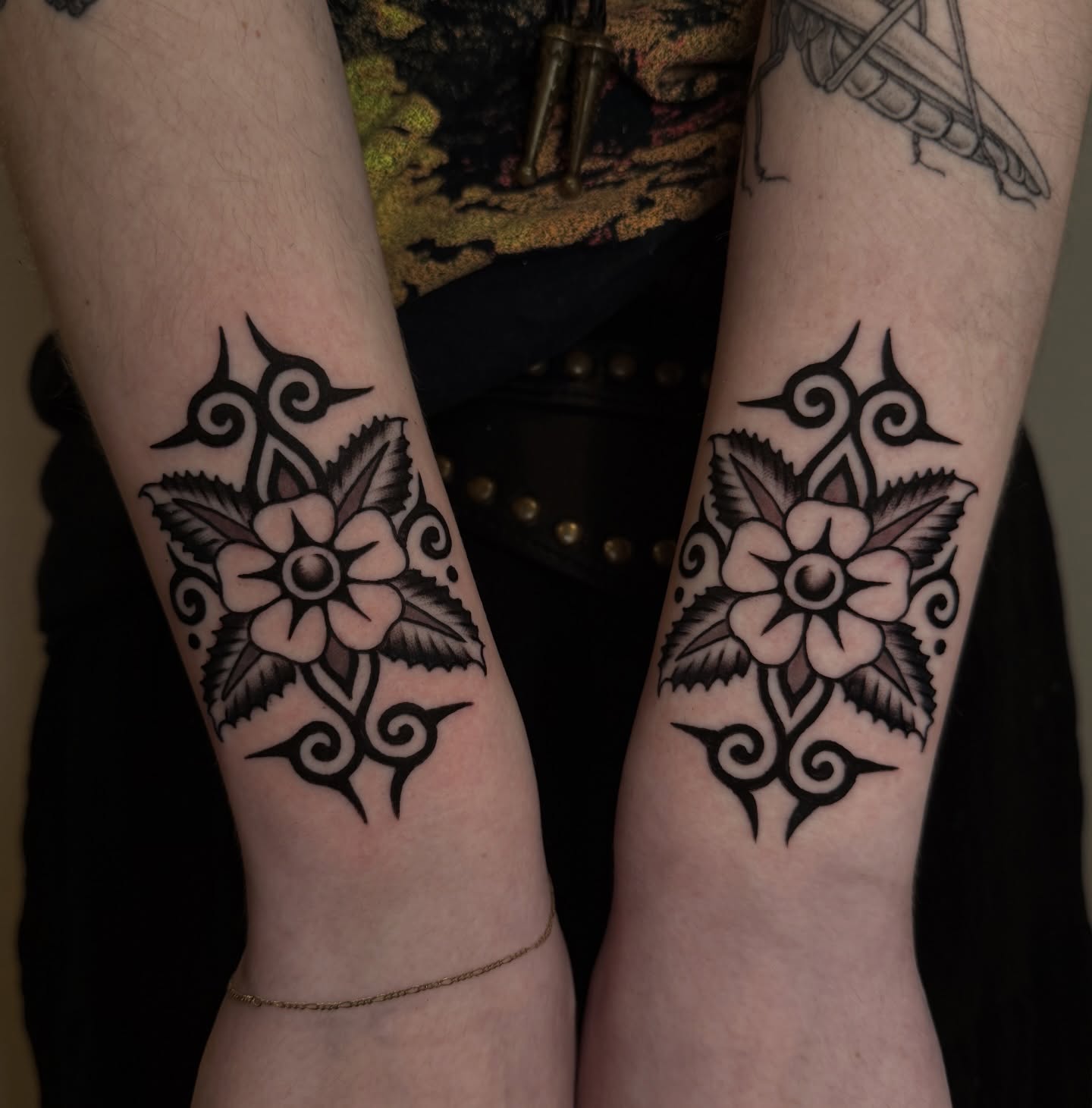 Floral design tribal tattoo on the forearm by kate