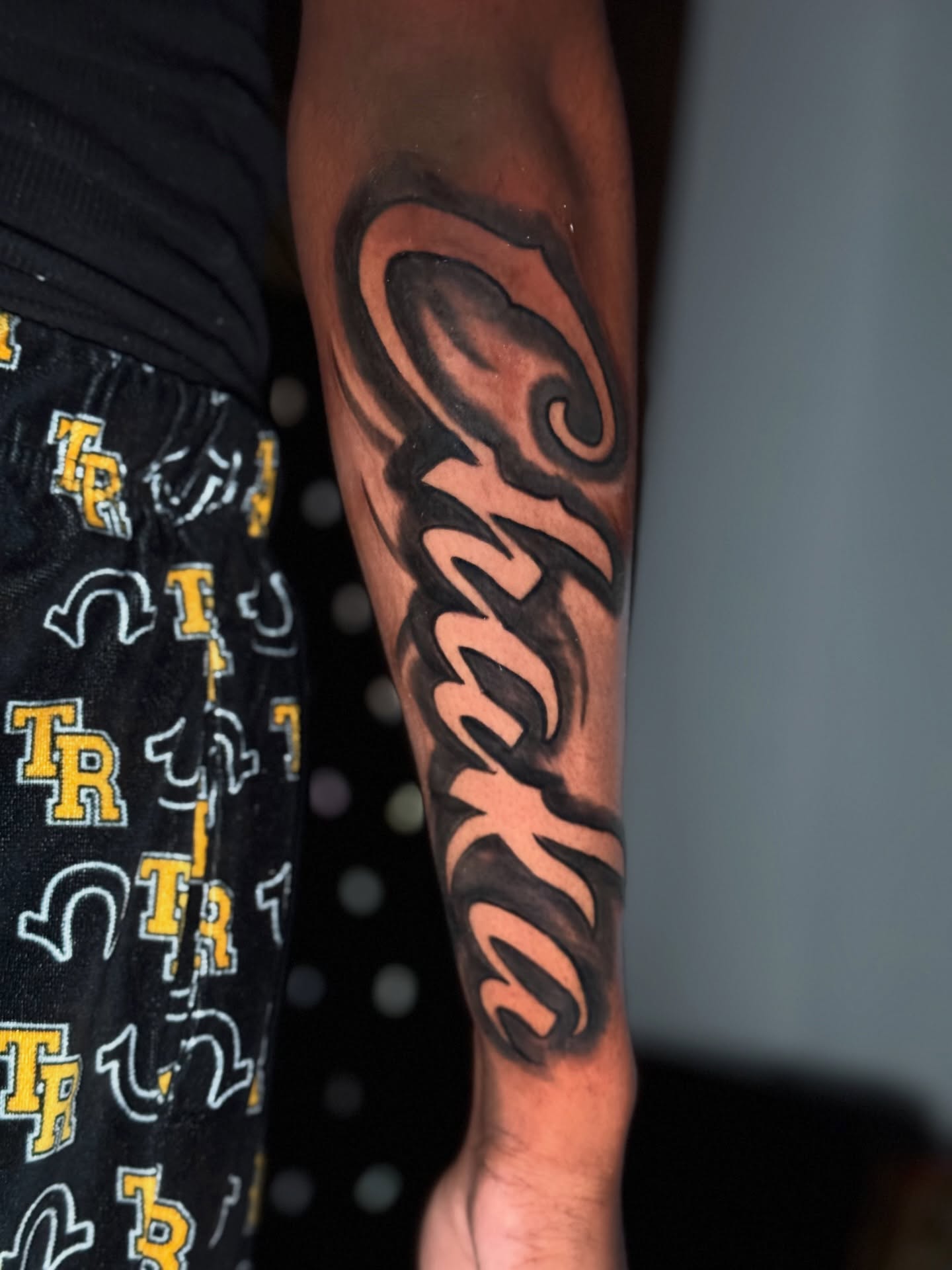 Script lettering lettering script tattoo on the forearm by Elijah Tattoos, San Diego, California