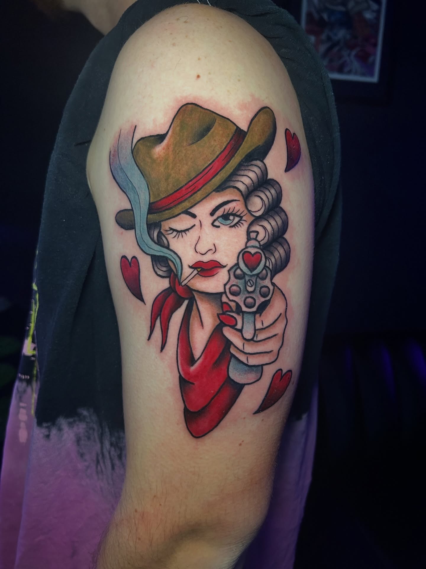 Cowgirl with gun American traditional tattoo on the forearm by Vanessa Kendyll’s Tattoos