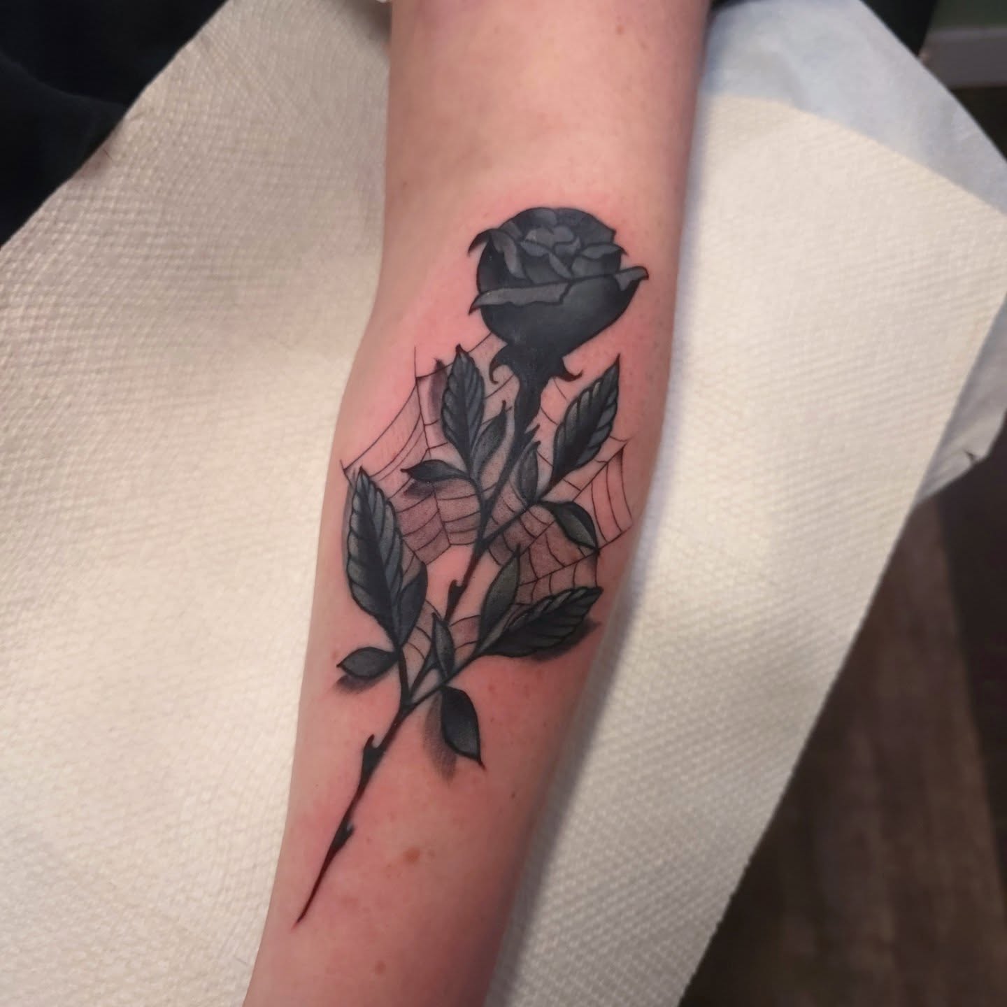 Rose black and grey tattoo on the forearm by Justin Ballard, #Edmonds, Edmonds, Washington
