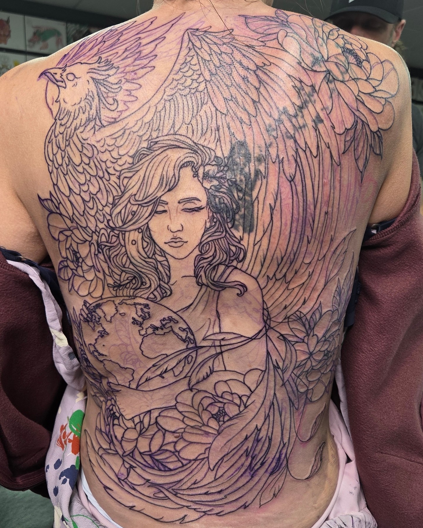 Angelic figure illustrative tattoo on the back by Trinity Renee