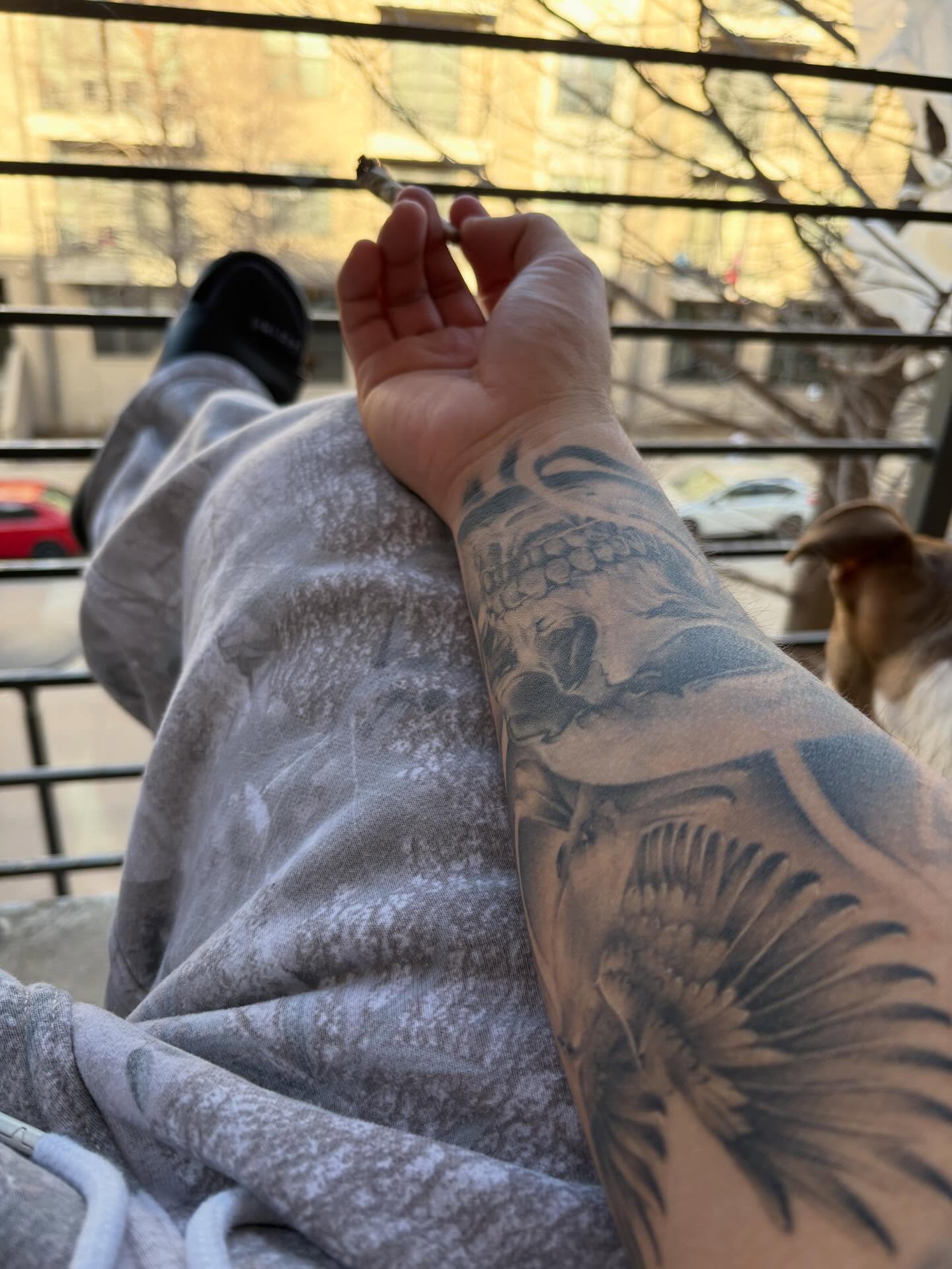 Fish black and grey tattoo on the forearm by Devin