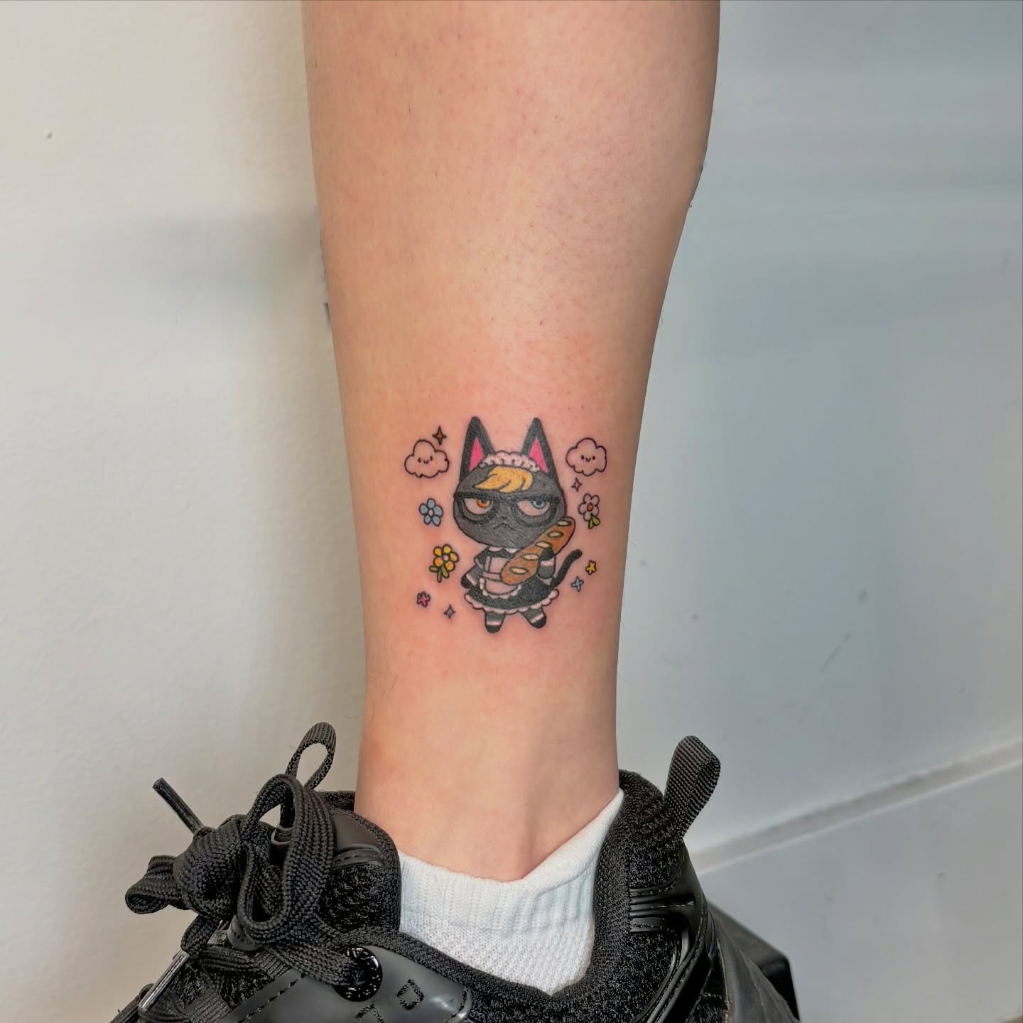 Cat dotwork tattoo on the calf by Rami, Maden🇰🇷