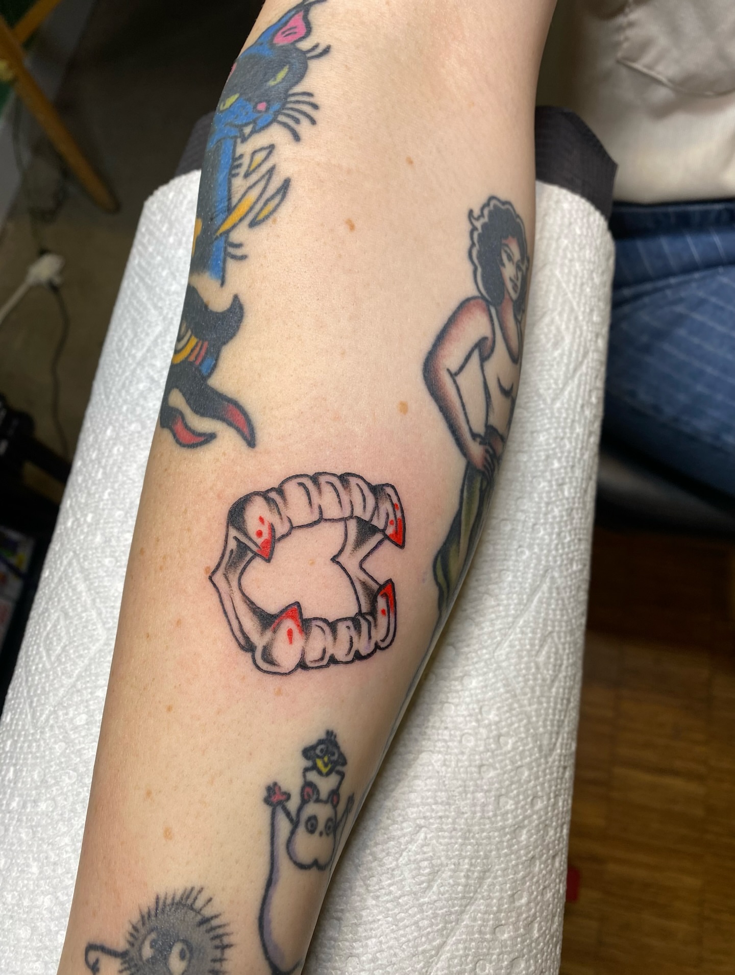 Clawed mouth American traditional tattoo on the forearm by Karl Hegwein, Portland, Oregon