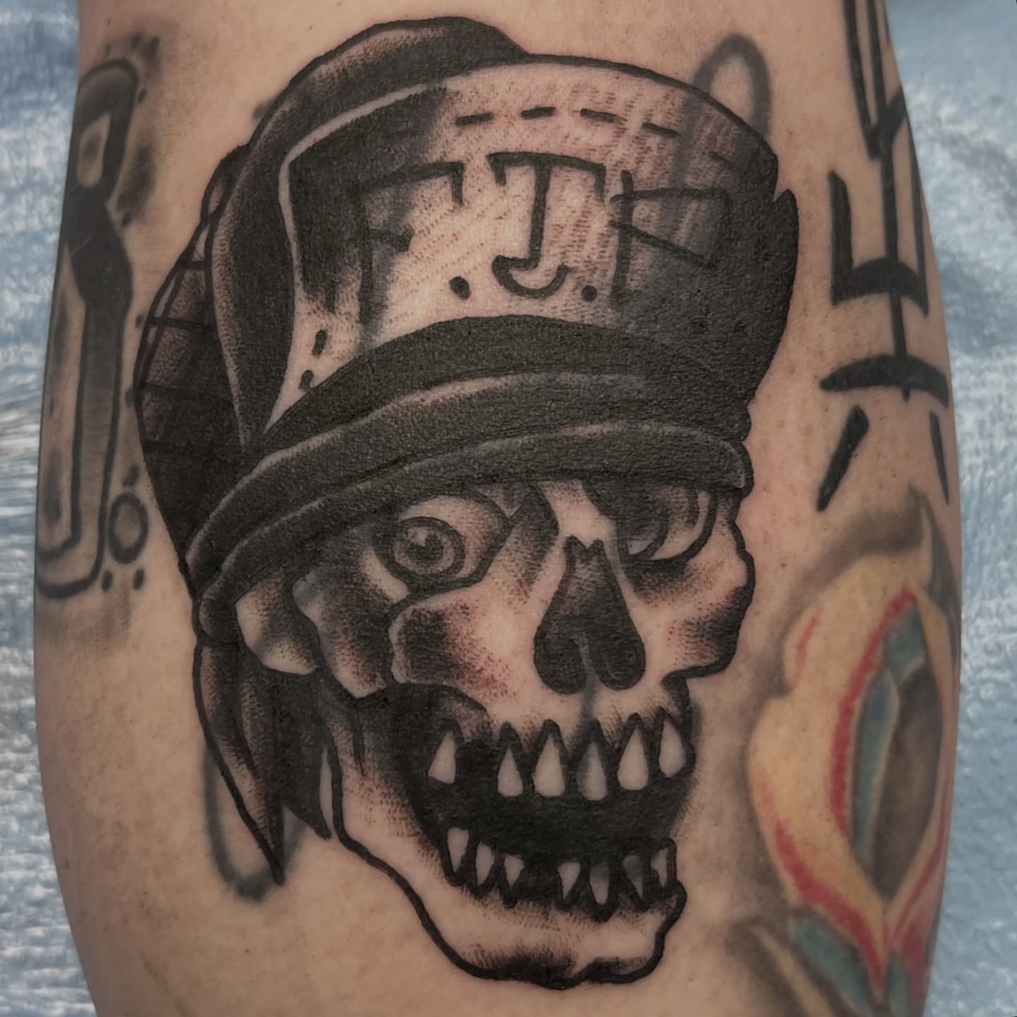 Skull wearing hat black and grey tattoo on the forearm by You’ll save me in your phone as Tattoo Tim