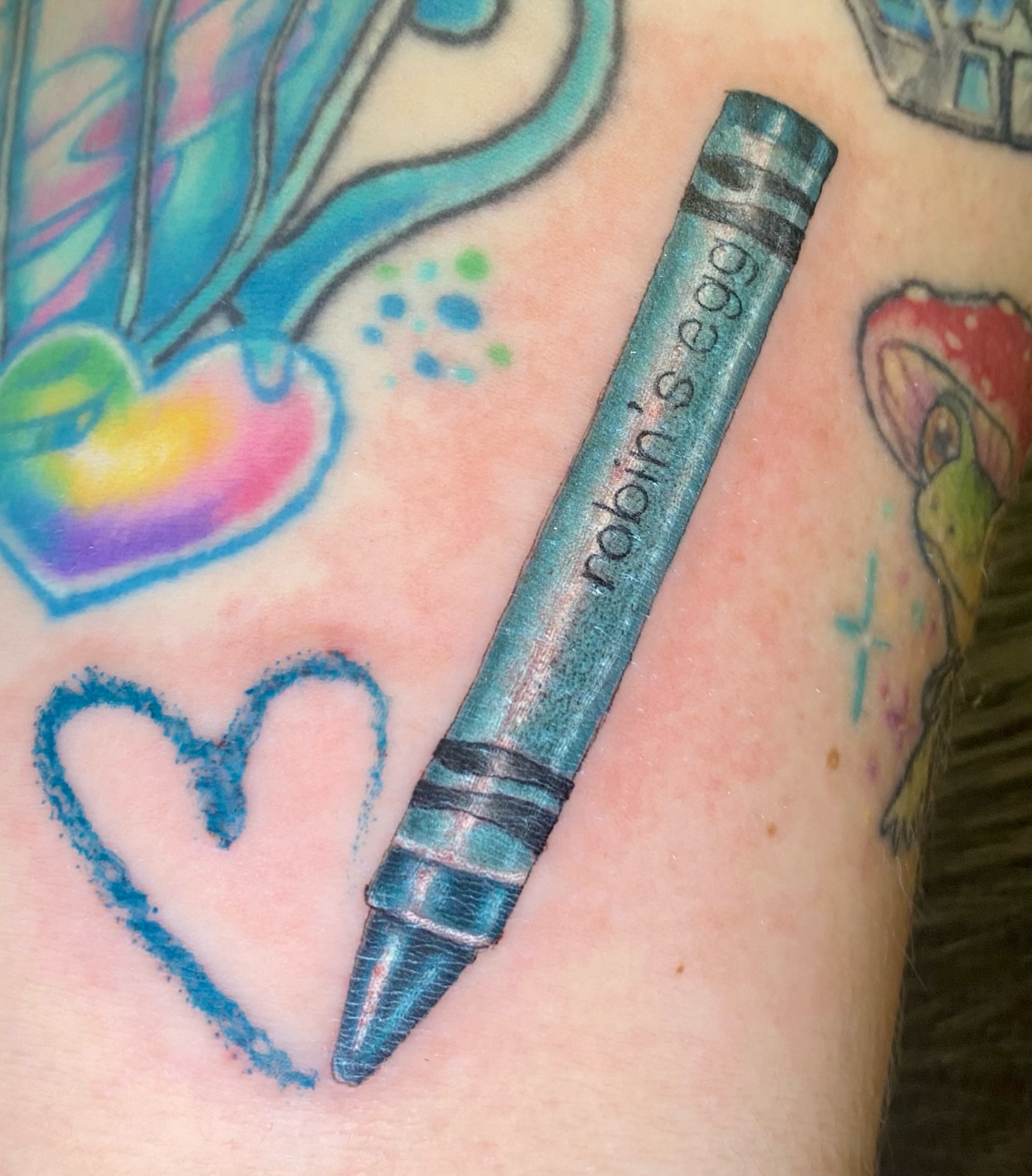 Crayon realism tattoo on the forearm by Brittany Whitaker