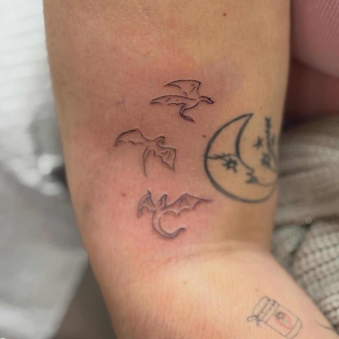 Dragons and crescent moon black and grey tattoo on the forearm by Milly Millwood Tattoos 💙 Lacey Anime Tattoo