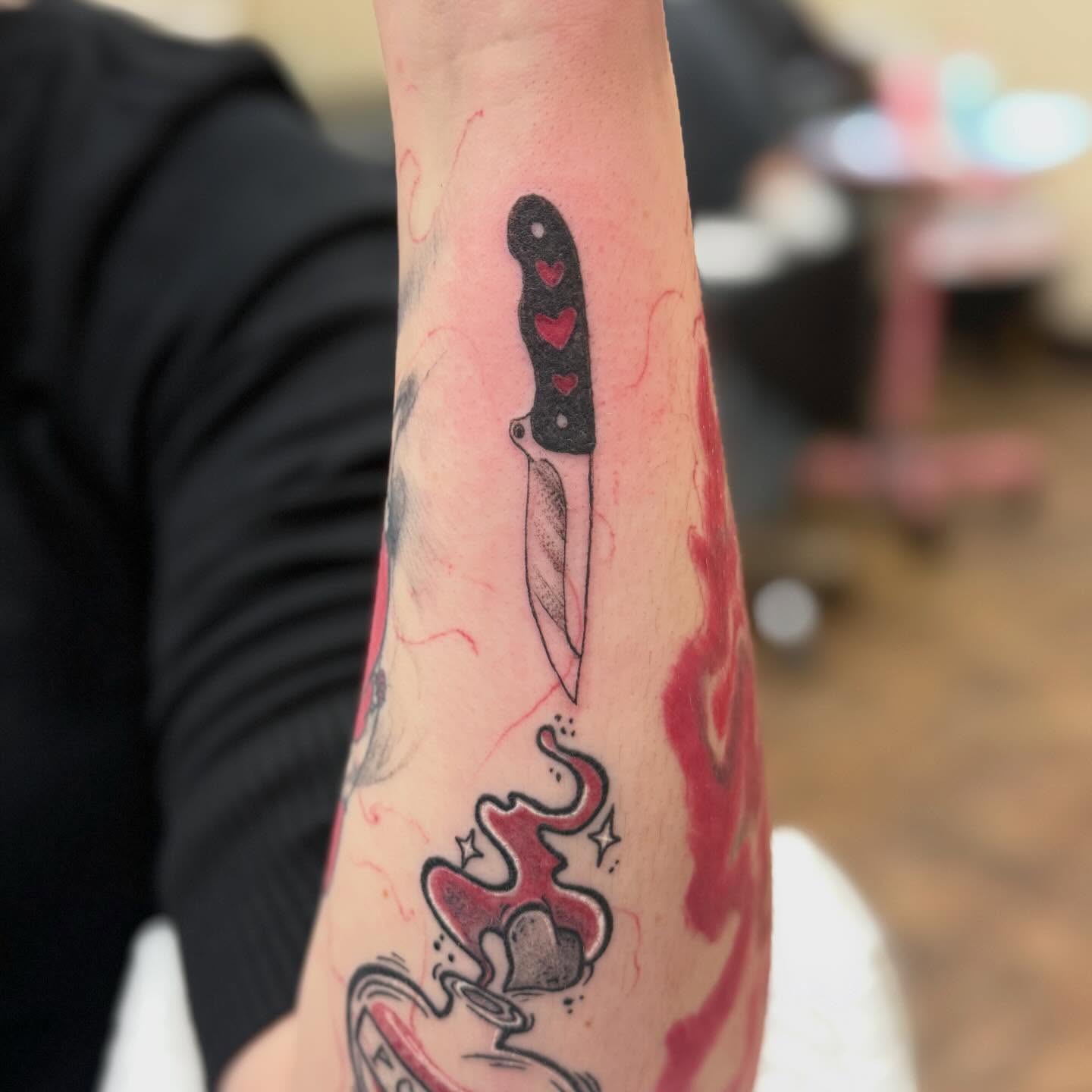 Knife with hearts black and grey tattoo on the forearm by Milly Millwood Tattoos 💙 Lacey Anime Tattoo