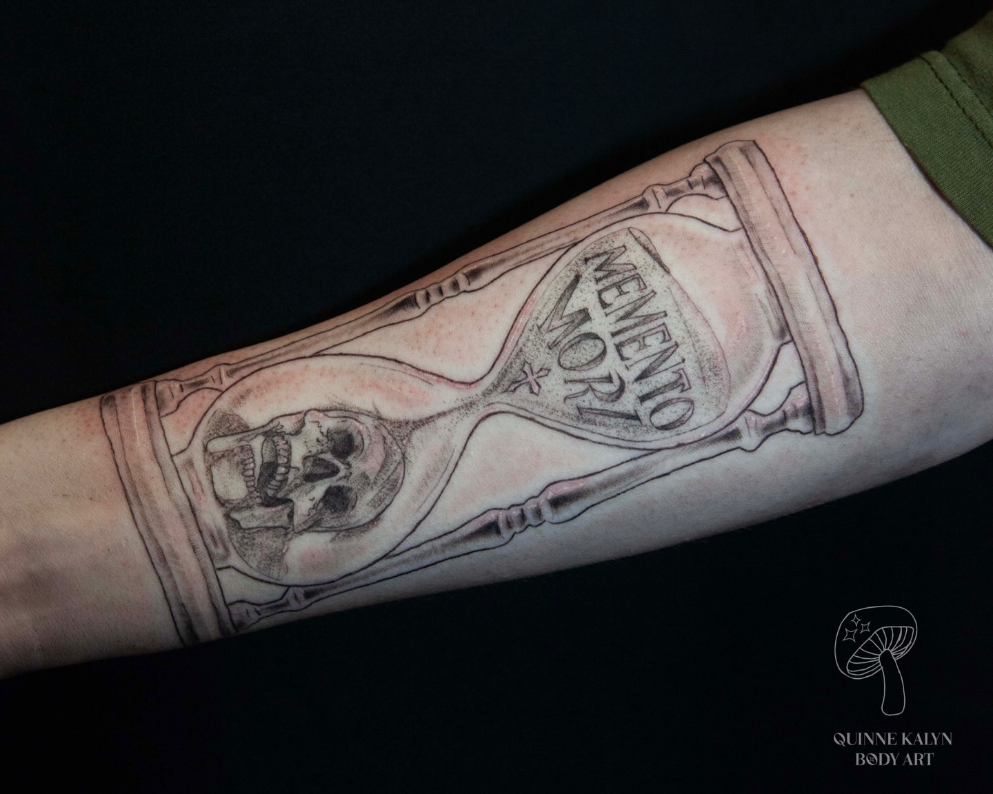 Hourglass with skull realism tattoo on the forearm by Nashville Piercer & Tattoo Artist ✨ Quinne