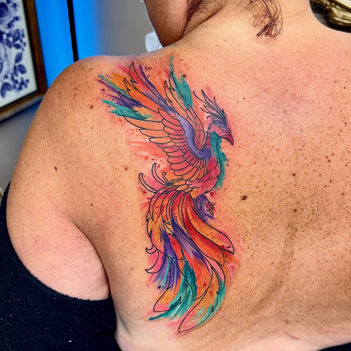 Phoenix watercolor tattoo on the back by Derek Cilla, Bethlehem, Pennsylvania
