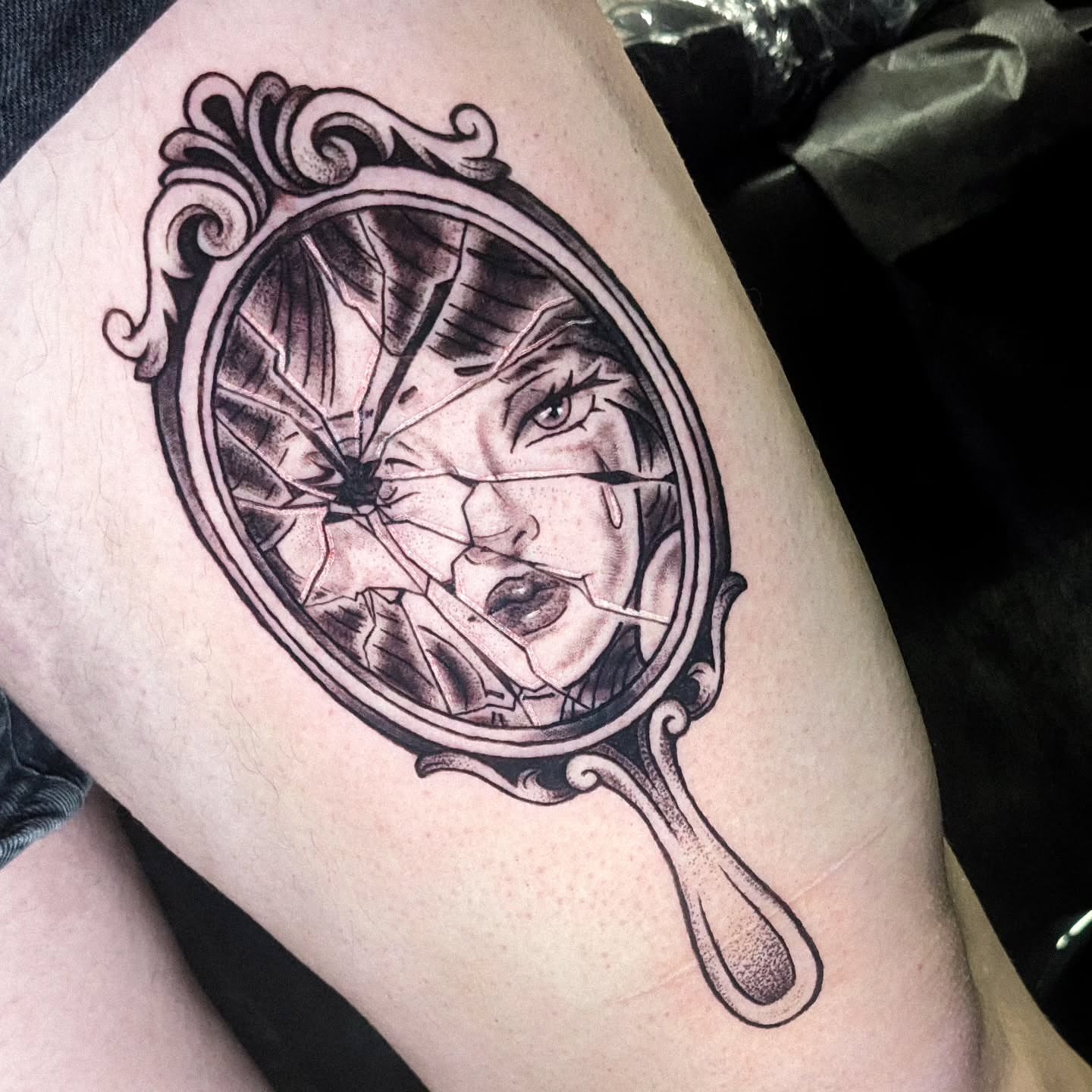 Broken mirror realism tattoo on the thigh by robin ✨ portland tattoo artist