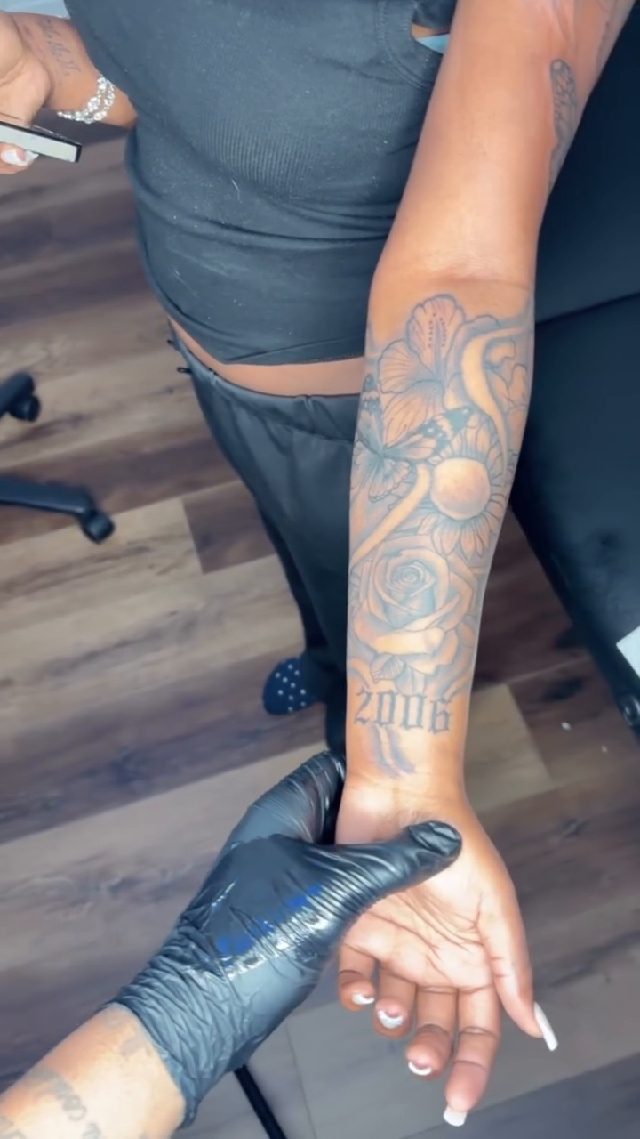 Floral and script tattoo on arm lettering tattoo on the upper arm by Chieftats614π₯