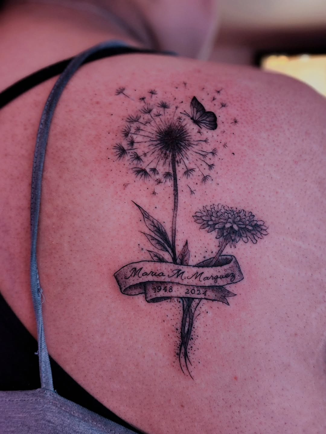 Dandelion and butterfly black and grey tattoo on the shoulder by Luke Jordan Ink, Louisville, Colorado
